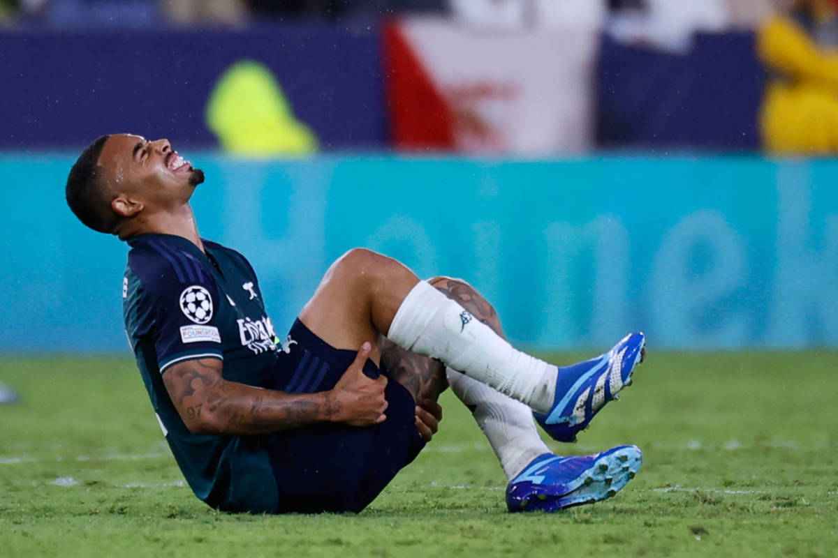 Arsenal striker Gabriel Jesus pictured in pain after suffering an injury in a Champions League game against Sevilla in October 2023
