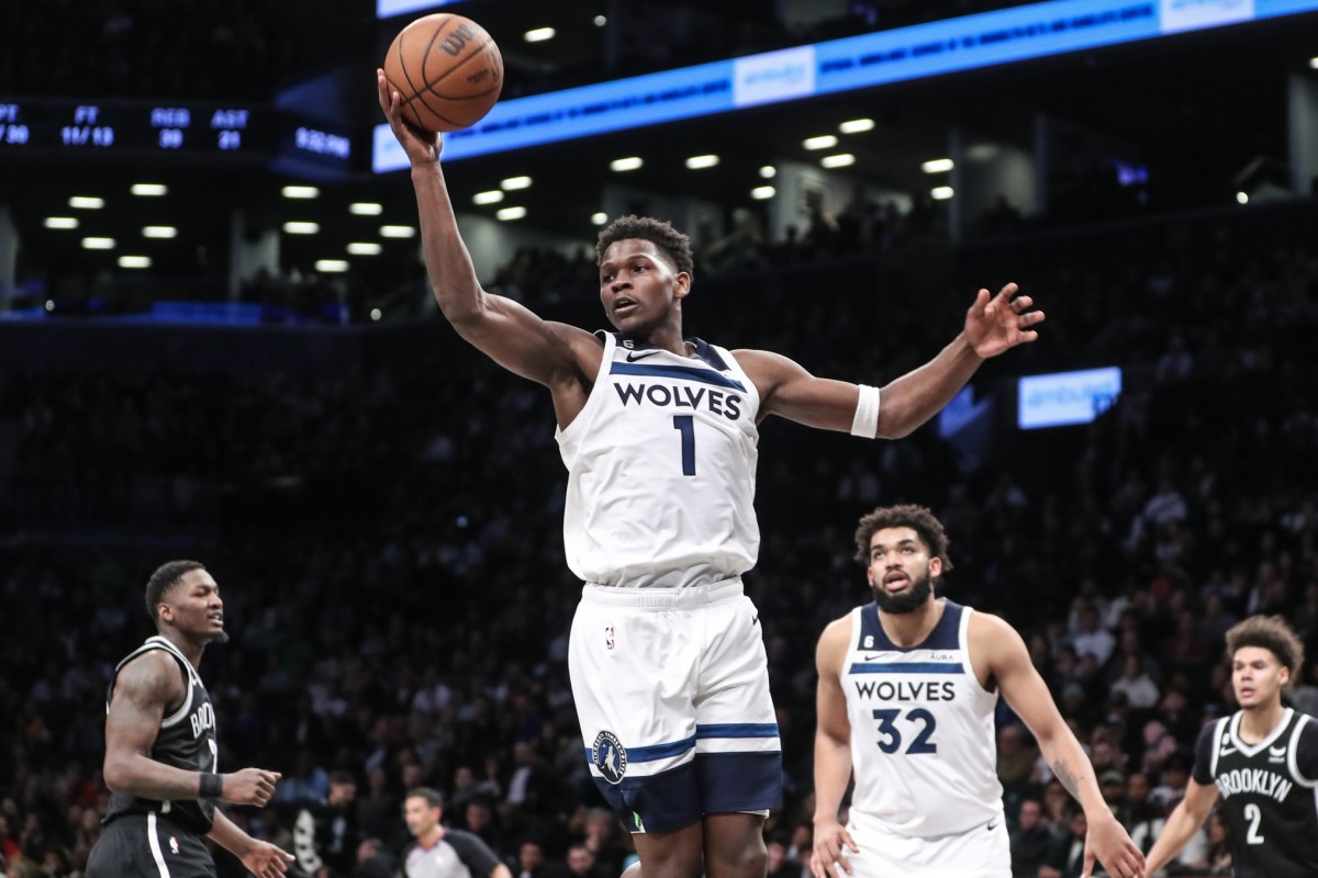 Apr 4, 2023; Brooklyn, New York, USA; Minnesota Timberwolves guard Anthony Edwards (1) grabs a rebound in the fourth quarter against the Brooklyn Nets at Barclays Center.
