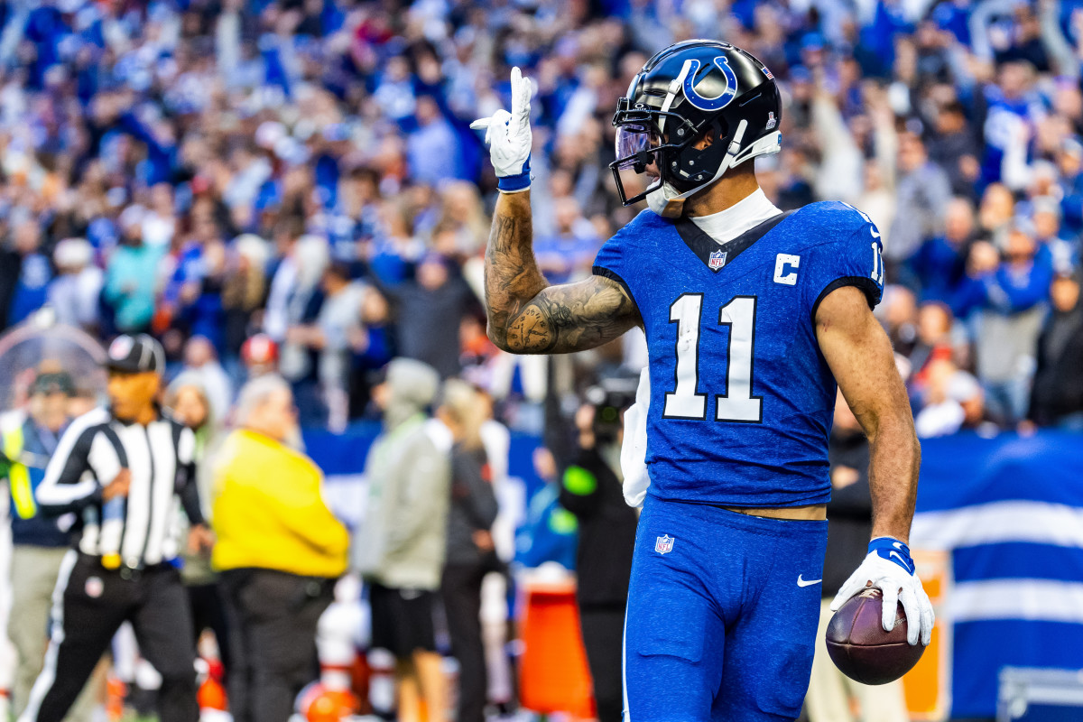 Oct 22, 2023; Indianapolis, Indiana, USA; Indianapolis Colts wide receiver Michael Pittman Jr. (11) celebrates his rushing touchdown in the second half against the Cleveland Browns at Lucas Oil Stadium. Mandatory Credit: Trevor Ruszkowski-USA TODAY Sports