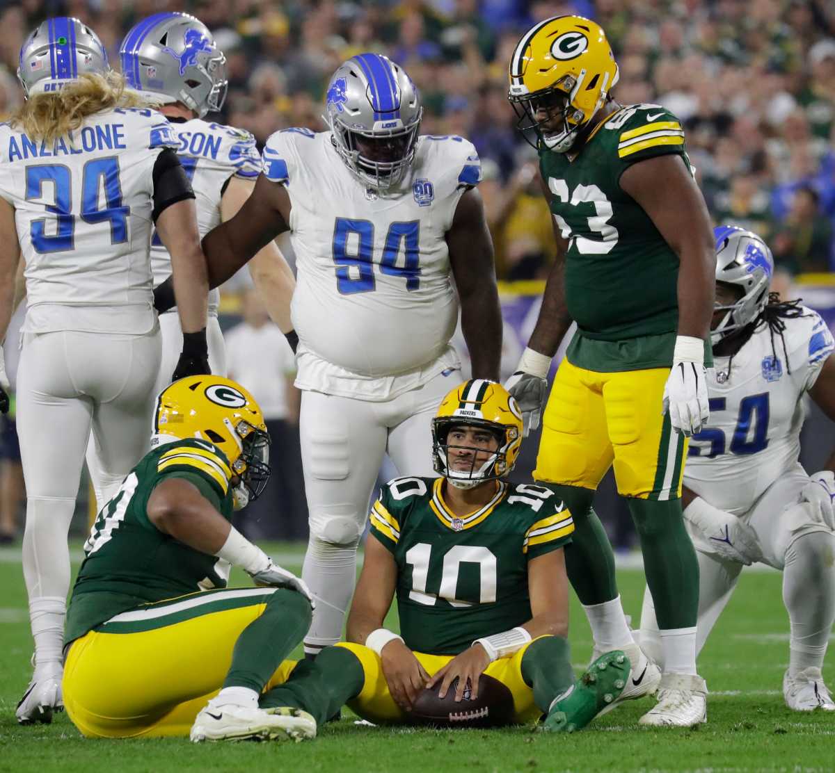 Green Bay Packers quarterback Jordan Love (10) reacts after getting sacked against the Detroit Lions in the first quarter during their football game Thursday, September 28, 2023, at Lambeau Field in Green Bay, Wis.