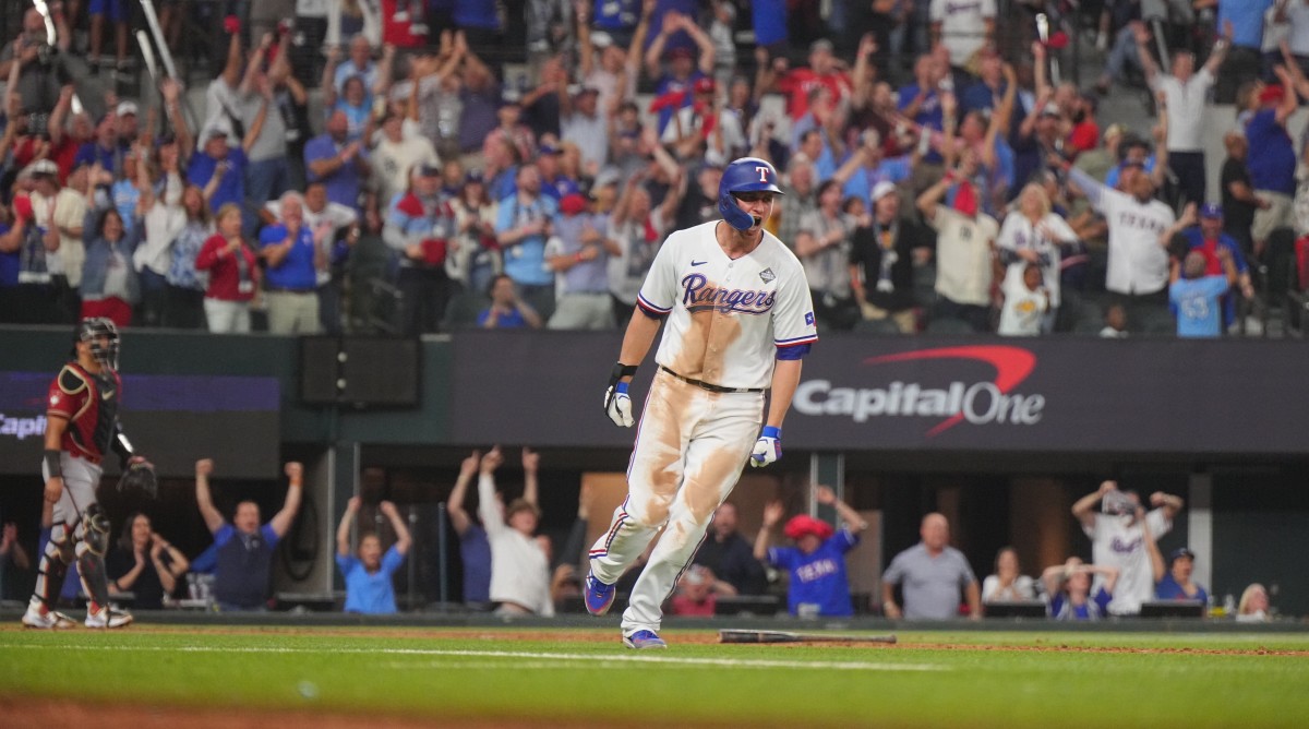 Rangers shortstop Corey Seager celebrates after hitting a home run in the bottom of the ninth inning in Game 1 of the World Series.