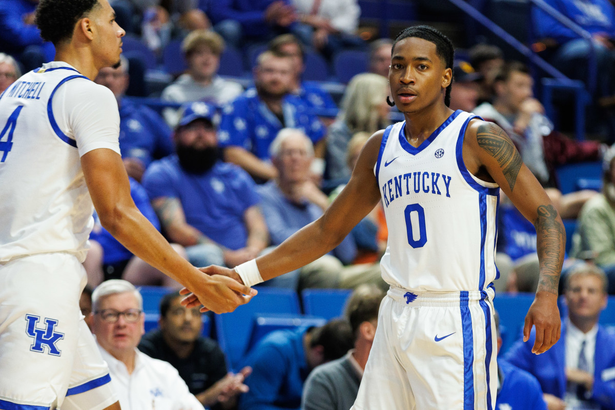 Oct 27, 2023; Lexington, KY, USA; Kentucky Wildcats guard Rob Dillingham (0) fives forward Tre Mitchell (4) during the first half against the Georgetown Tigers at Rupp Arena. Mandatory Credit: Jordan Prather-USA TODAY Sports