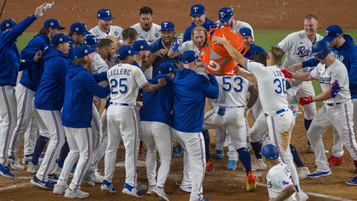 The Texas Rangers celebrate their Game 1 World Series win.