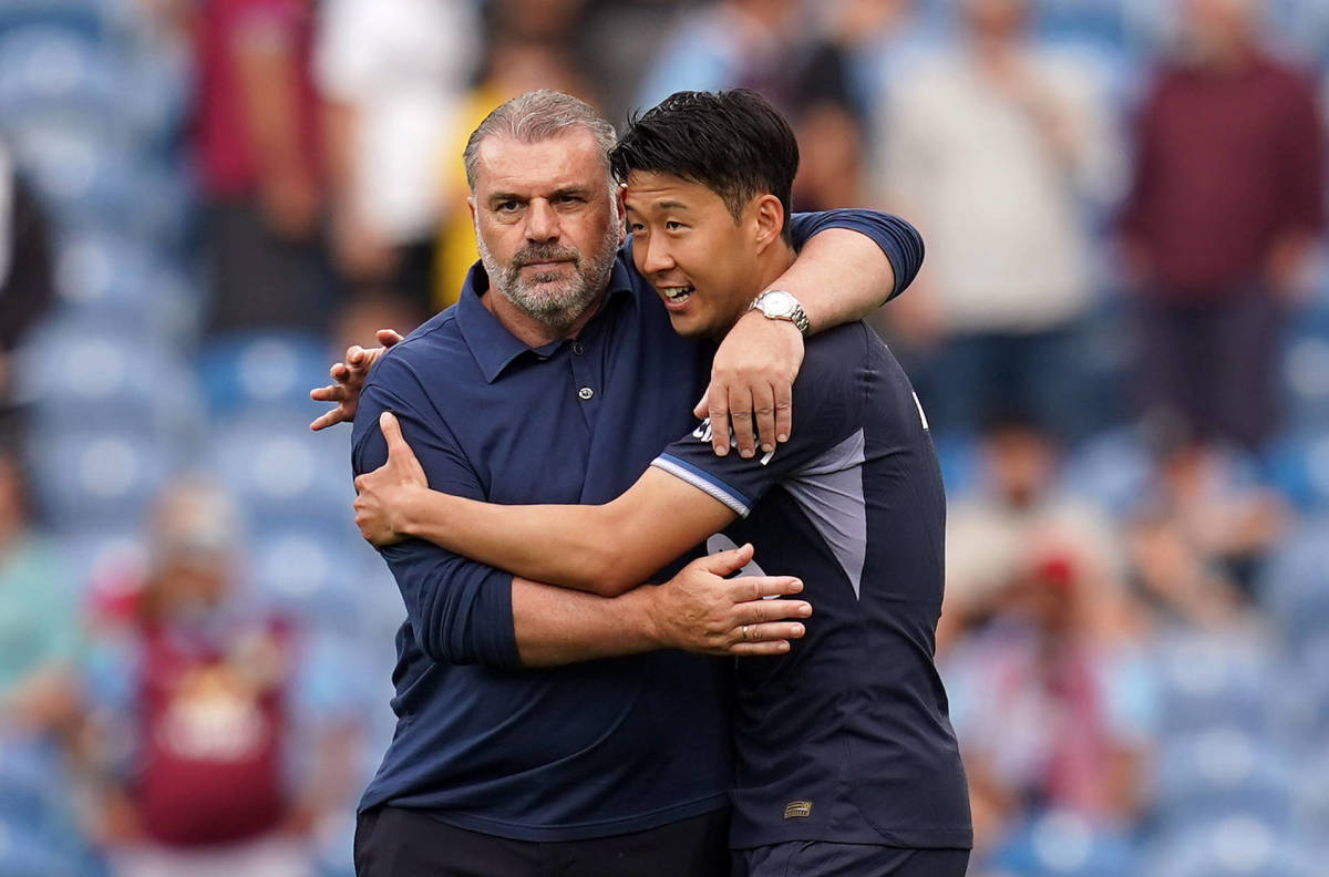 Tottenham Hotspur manager Ange Postecoglou (left) and Son Heung-min pictured hugging after a 5-2 win over Burnley in September 2023