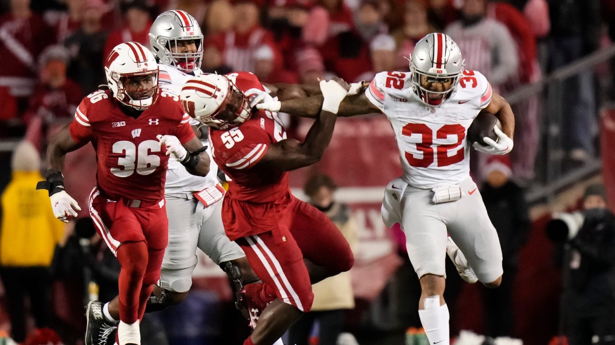 Henderson gashed the Wisconsin defense for 162 rushing yards on 24 carries in a 24–10 win.