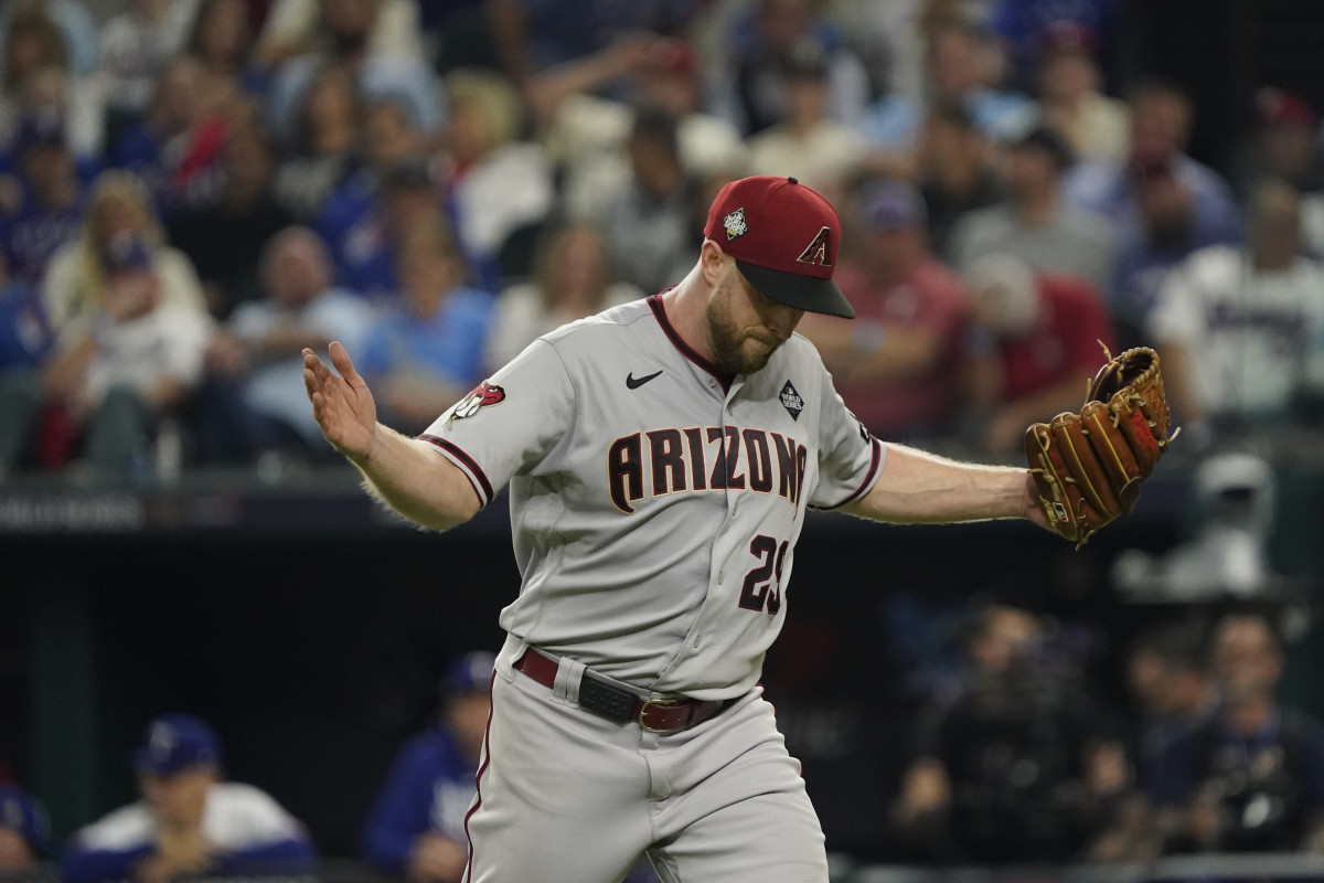 Oct 28, 2023; Arlington, TX, USA; Arizona Diamondbacks relief pitcher Merrill Kelly (29) reacts in the in the seventh inning against the Texas Rangers in game two of the 2023 World Series at Globe Life Field. Mandatory Credit: Raymond Carlin III-USA TODAY Sports