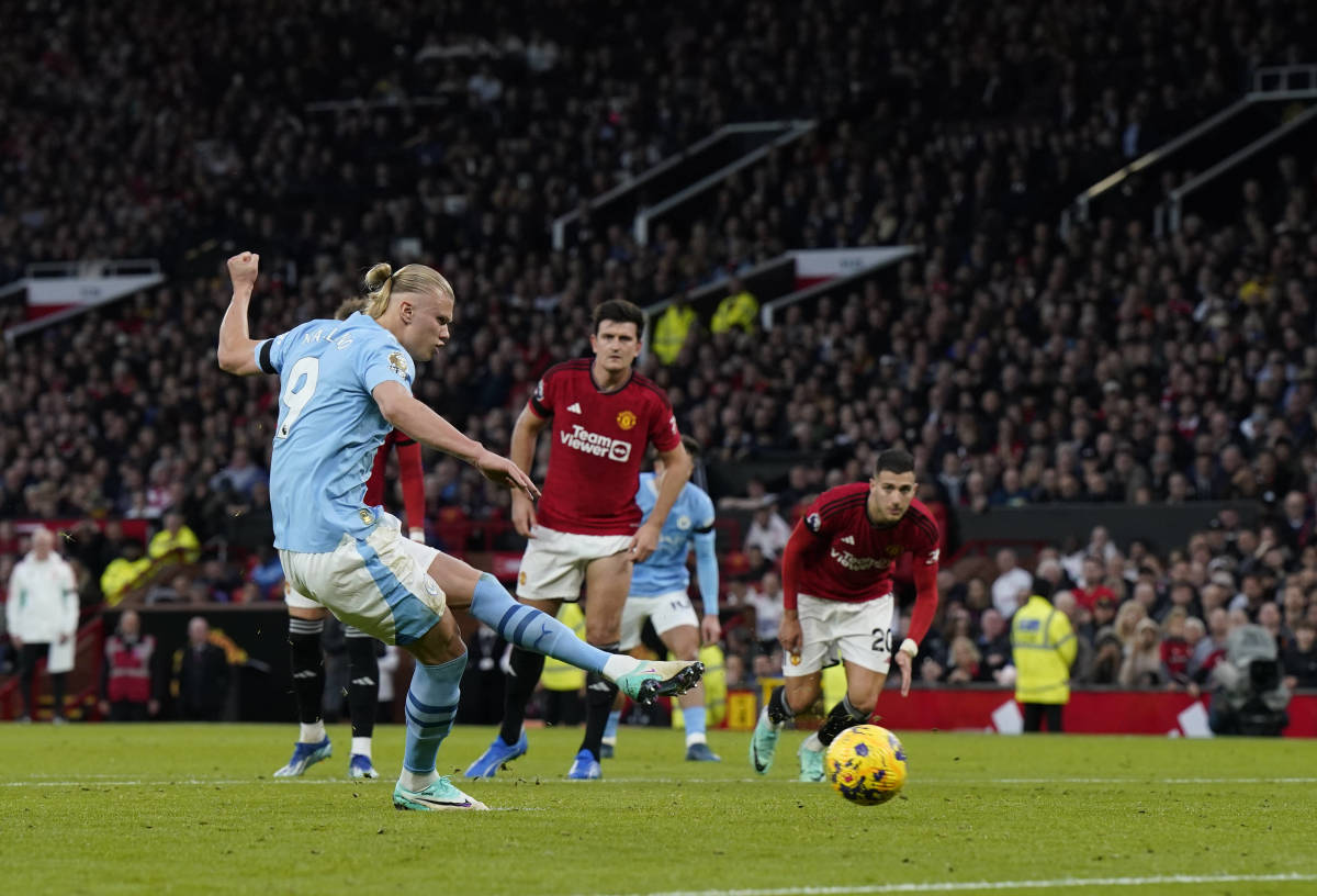 Erling Haaland pictured converting a penalty kick for Manchester City against Manchester United at Old Trafford in October 2023
