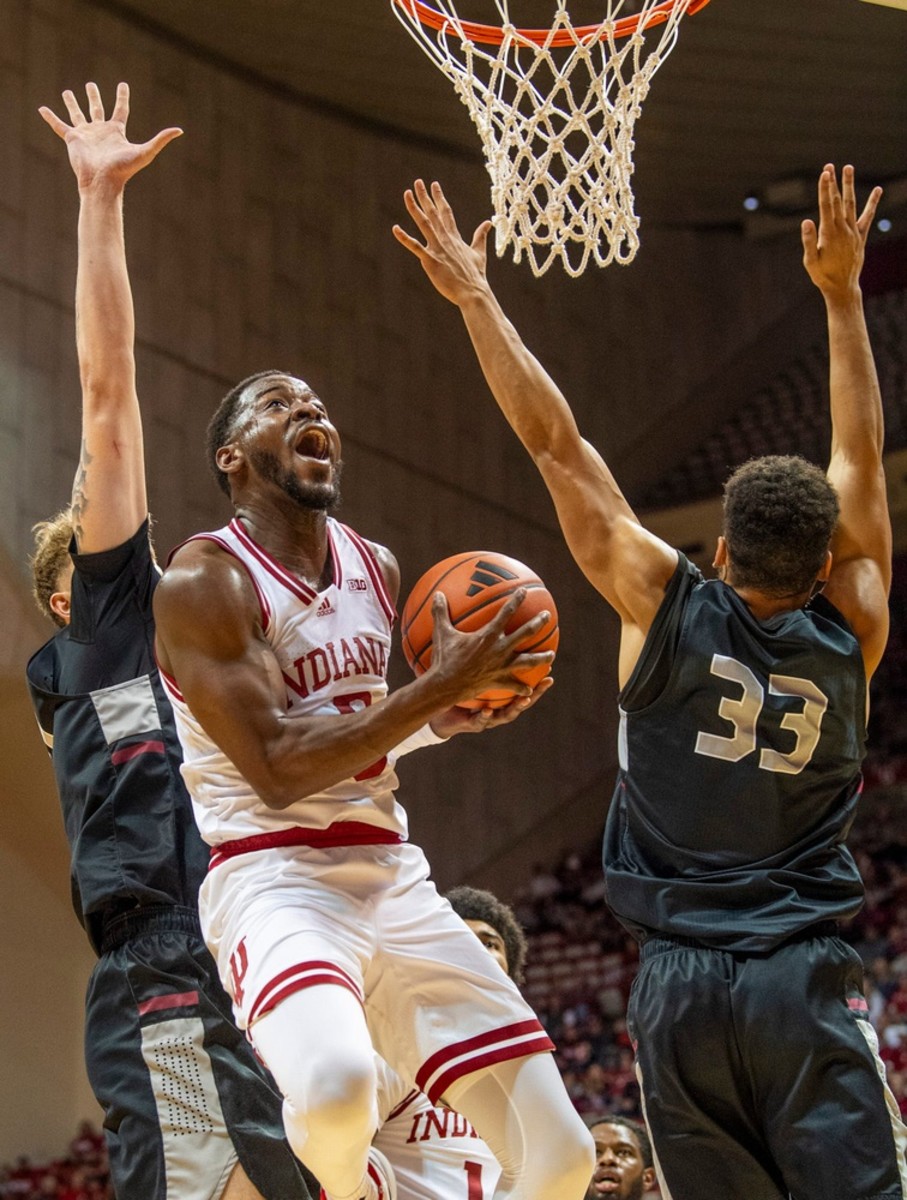 Indiana's Xavier Johnson (0) shoots during the Indiana versus University of Indianapolis men's basketball game at Simon Skjodt Assembly Hall on Sunday, Oct. 29, 2023.