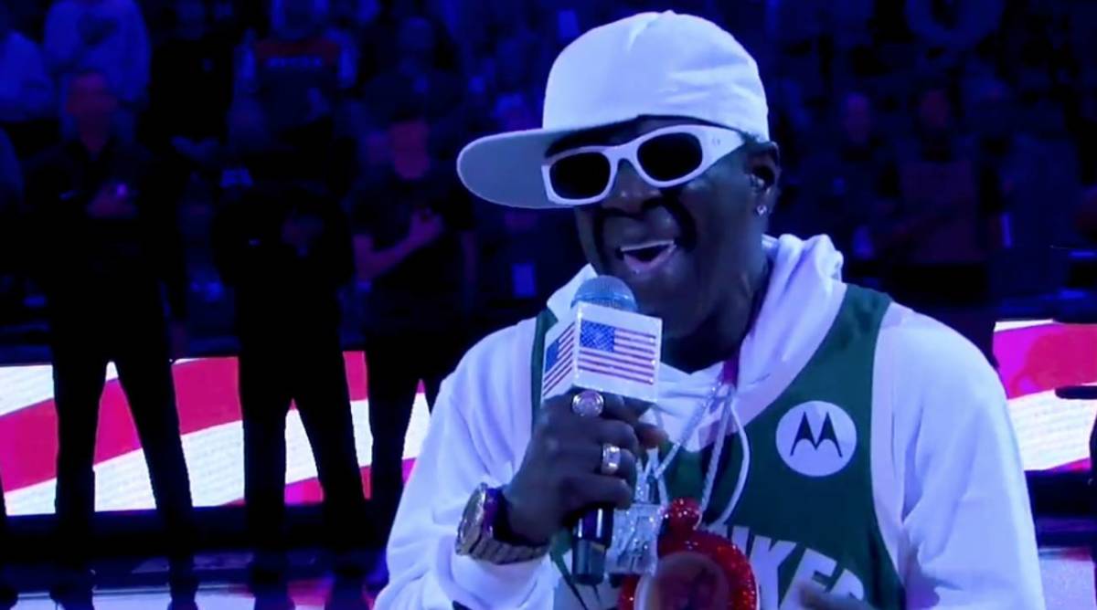 Flavor Flav sings the national anthem before the Hawks-Bucks game in Milwaukee on Sunday night. .