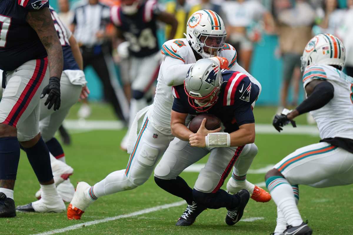 Miami Dolphins linebacker Bradley Chubb (2) sacks New England Patriots quarterback Mac Jones (10) during the second half of an NFL game at Hard Rock Stadium in Miami Gardens, Oct. 29, 2023.