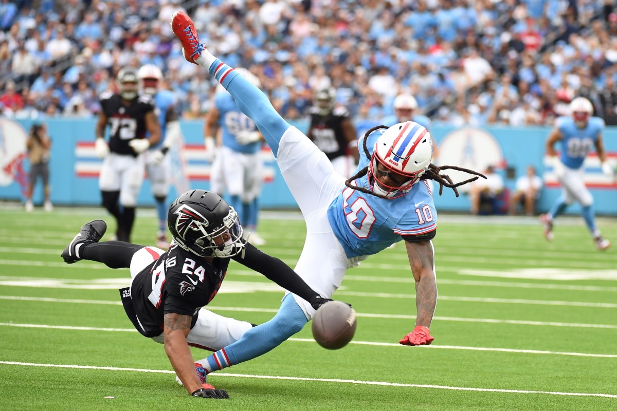 Tennessee Titans wide receiver DeAndre Hopkins (10) has a catch attempt broken up by Atlanta Falcons cornerback A.J. Terrell (24) during the first half at Nissan Stadium. 