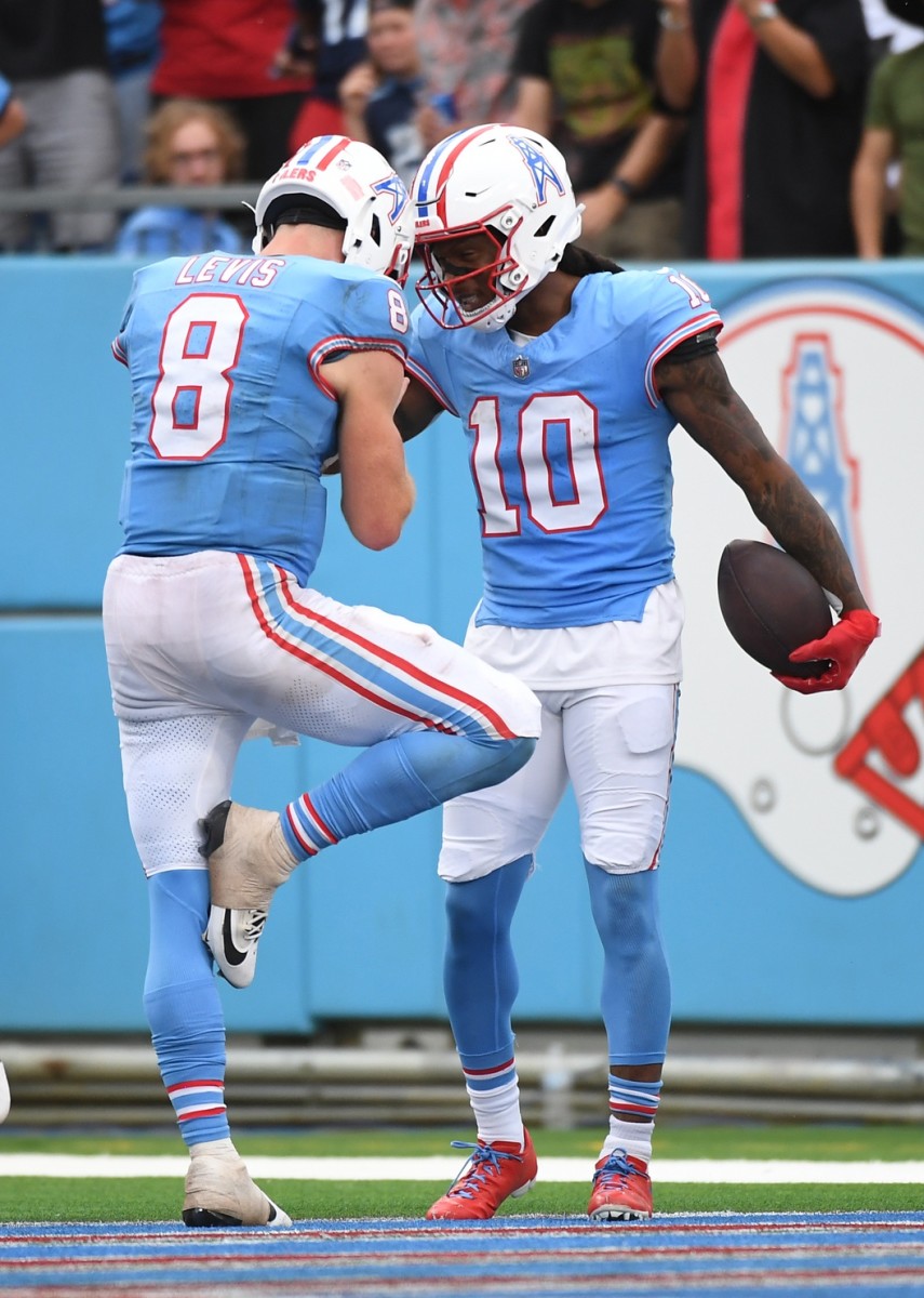 Tennessee Titans wide receiver DeAndre Hopkins (10) and quarterback Will Levis (8) celebrate after a touchdown during the second half against the Atlanta Falcons at Nissan Stadium.