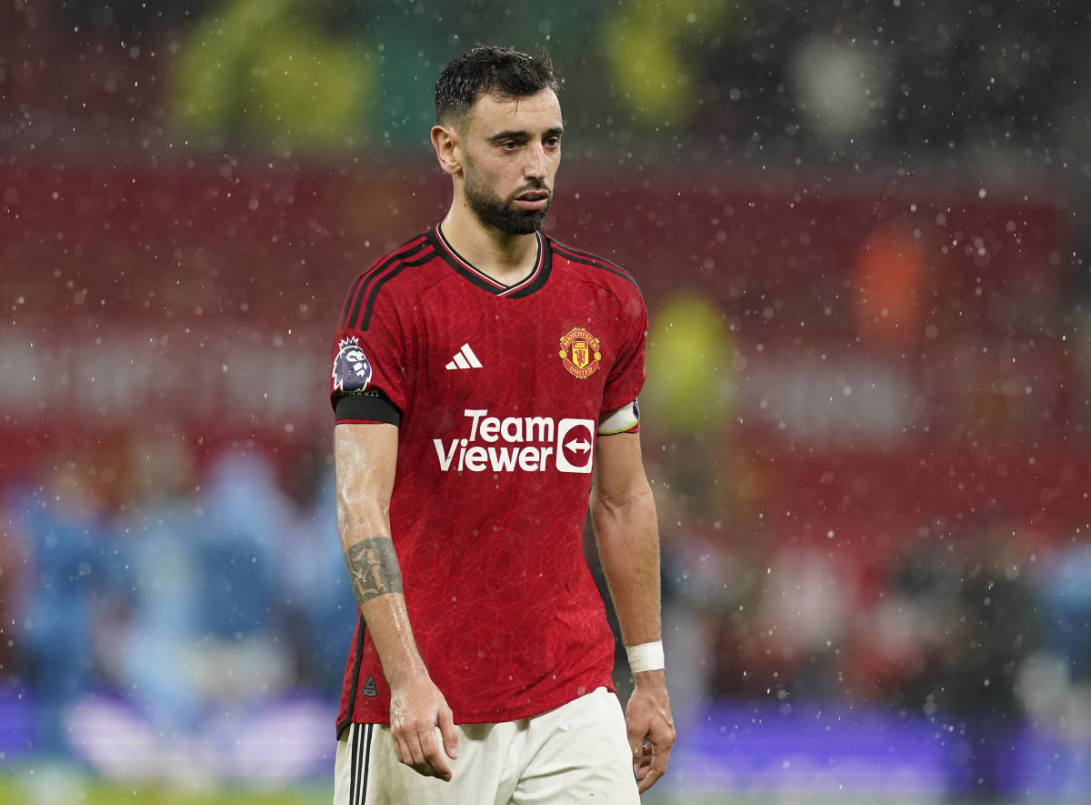 Manchester United captain Bruno Fernandes pictured looking dejected during his team's 3-0 home defeat against Manchester City in October 2023