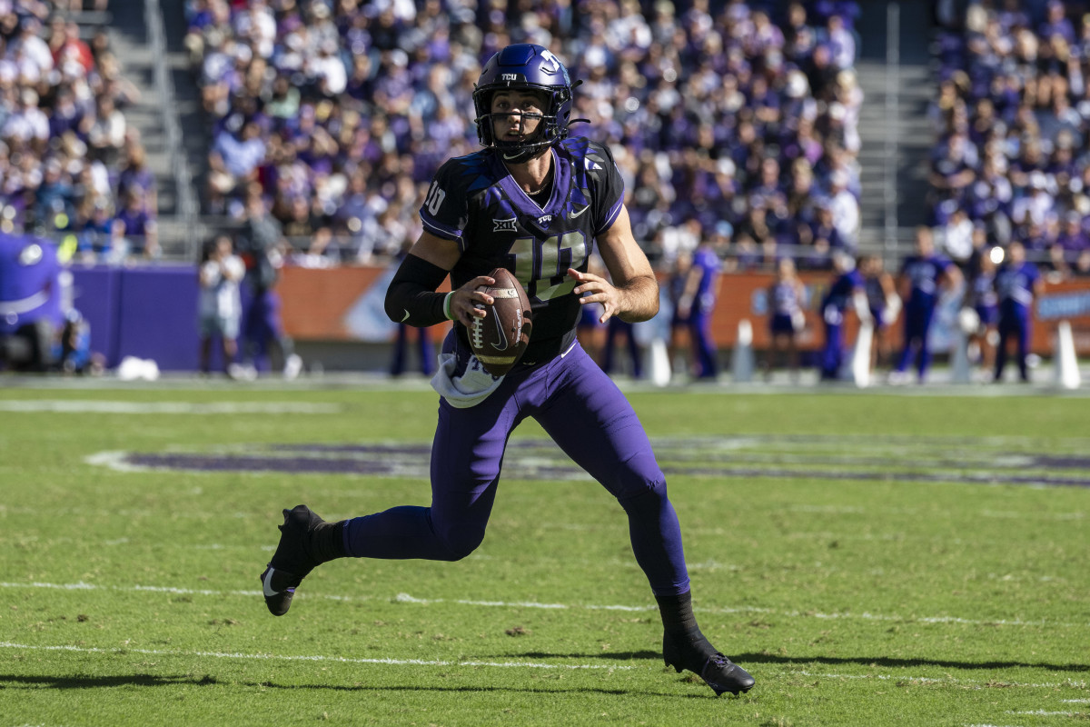 Oct 14, 2023; Fort Worth, Texas, USA; TCU Horned Frogs quarterback Josh Hoover (10) rolls out to pass against the Brigham Young Cougars during the game at Amon G. Carter Stadium. Mandatory Credit: Jerome Miron-USA TODAY Sports