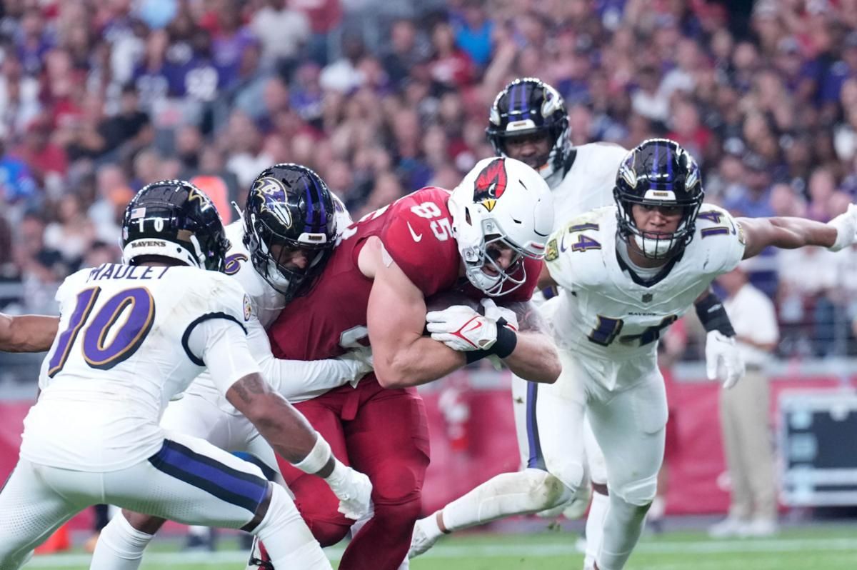 Arizona Cardinals tight end Trey McBride (85) catches a pass and scores a touchdown during the second half at State Farm Stadium.