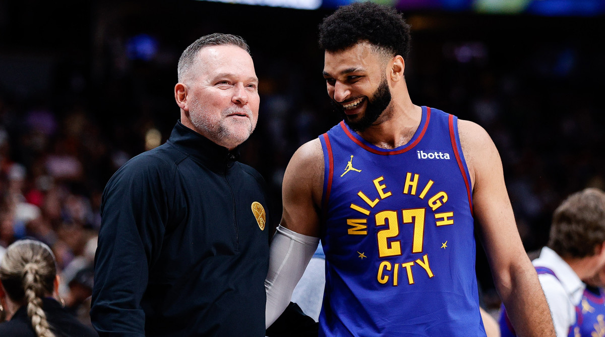 Denver Nuggets head coach Michael Malone and guard Jamal Murray smile on the sidelines while beating the Los Angeles Lakers.