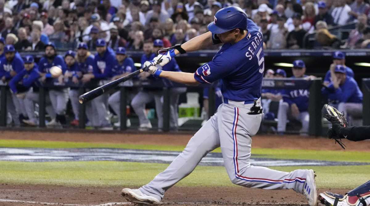 Rangers shortstop Corey Seager hits a home run during Game 3 of the 2023 World Series