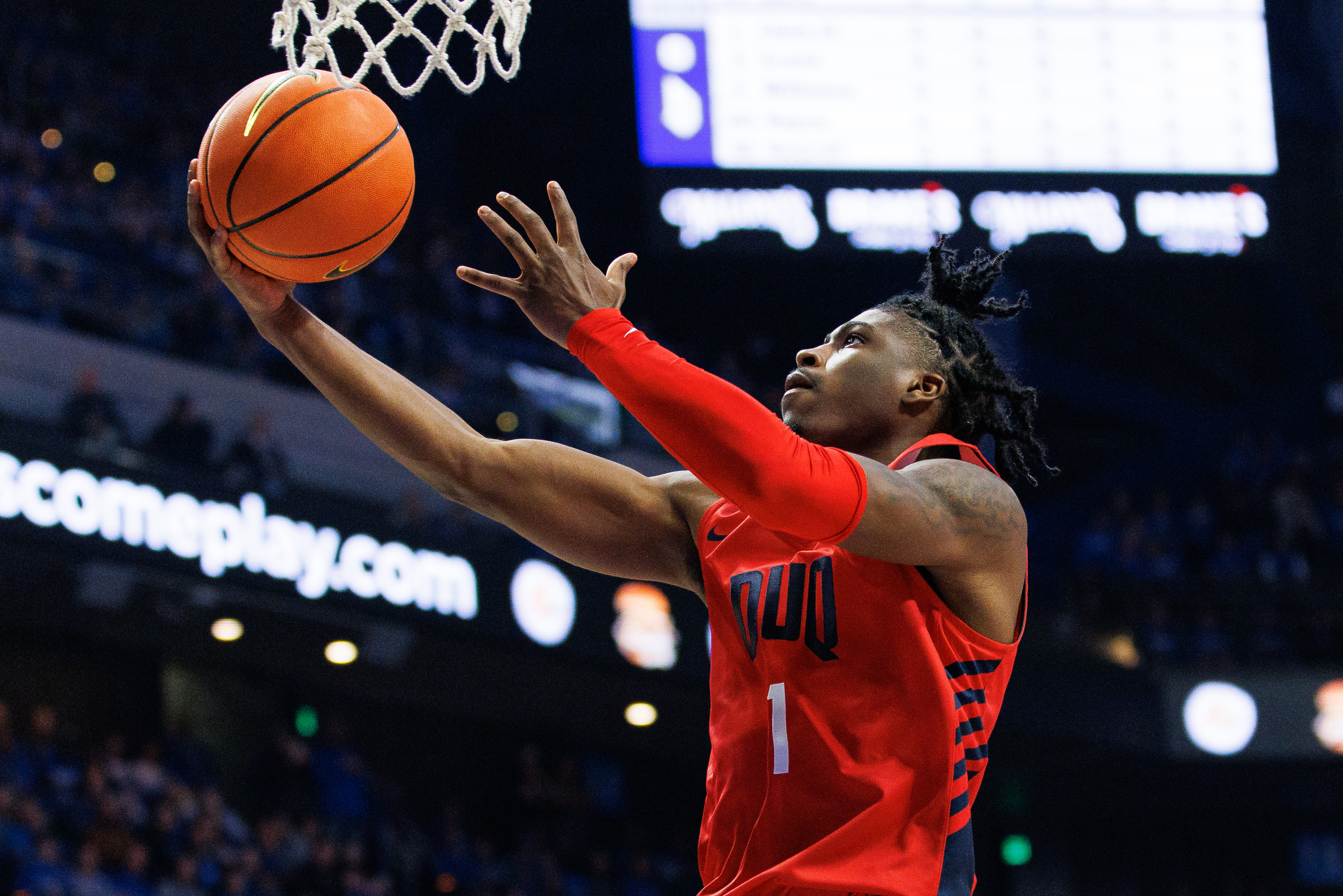 Nov 11, 2022; Lexington, Kentucky, USA; Duquesne Dukes guard Jimmy Clark III (1) goes to the basket during the first half against the Kentucky Wildcats at Rupp Arena at Central Bank Center.