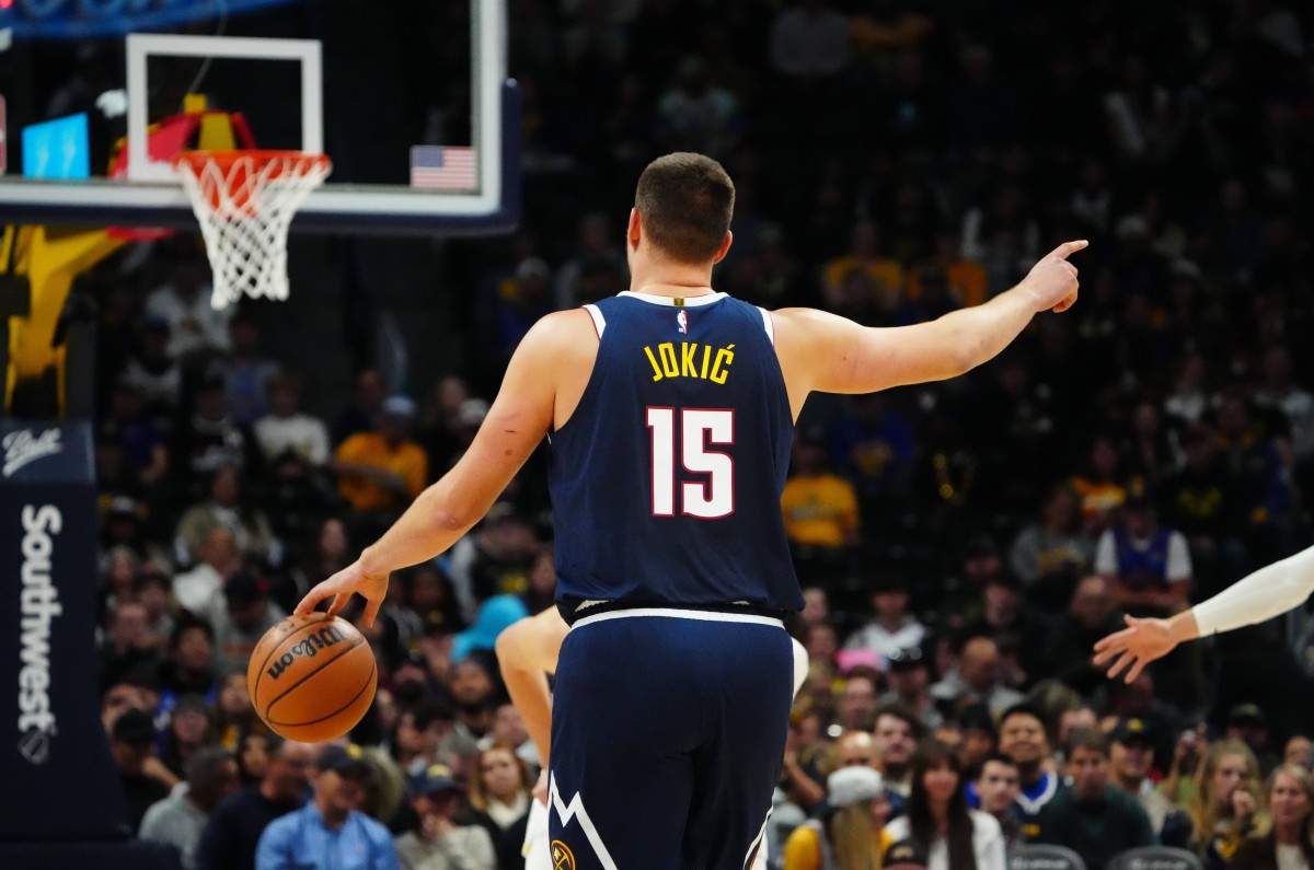 Denver Nuggets center Nikola Jokic gestures up court