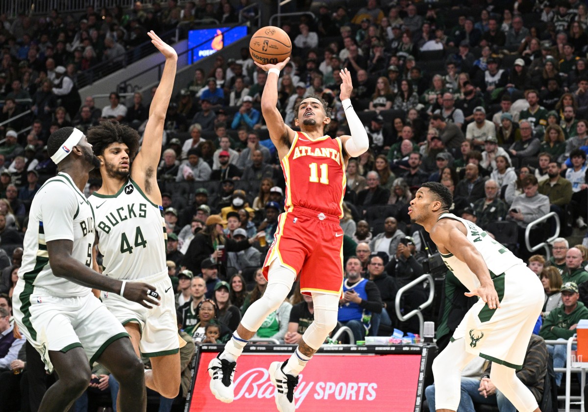Atlanta Hawks guard Trae Young shoots against the Milwaukee Bucks