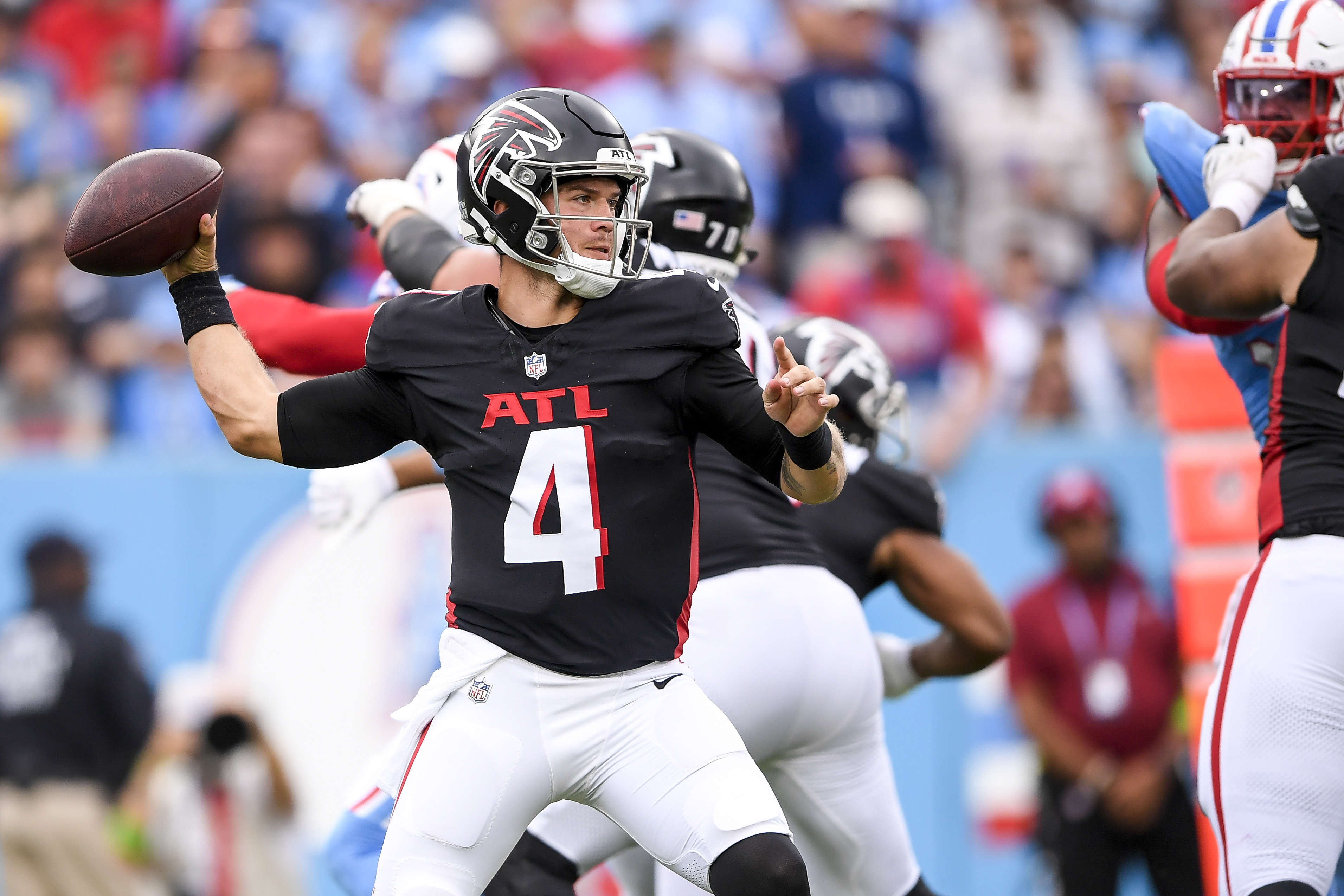 Atlanta Falcons quarterback Taylor Heinicke (4) stands in the pocket against the Tennessee Titans during the second half at Nissan Stadium.