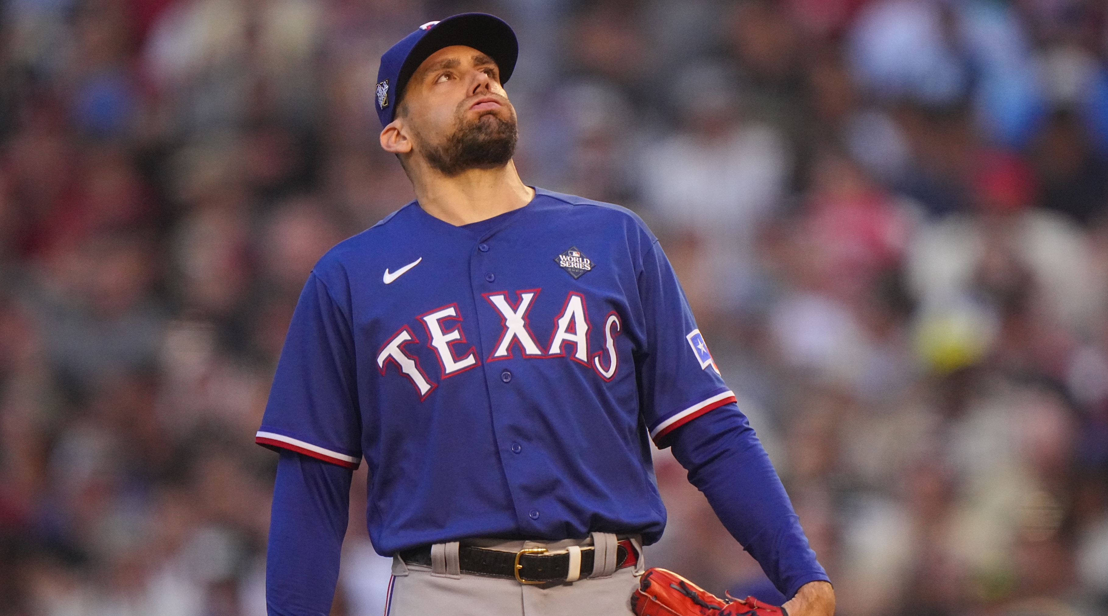Rangers starting pitcher Nathan Eovaldi looks up while on the mound during Game 5 of the World Series.