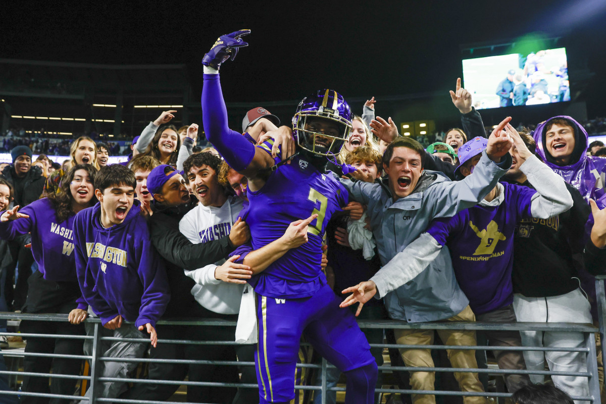 Oct 21, 2023; Seattle, Washington, USA; Washington Huskies safety Mishael Powell (3) celebrates with fans in the student section following a 15-7 victory against the Arizona State Sun Devils at Alaska Airlines Field at Husky Stadium. 