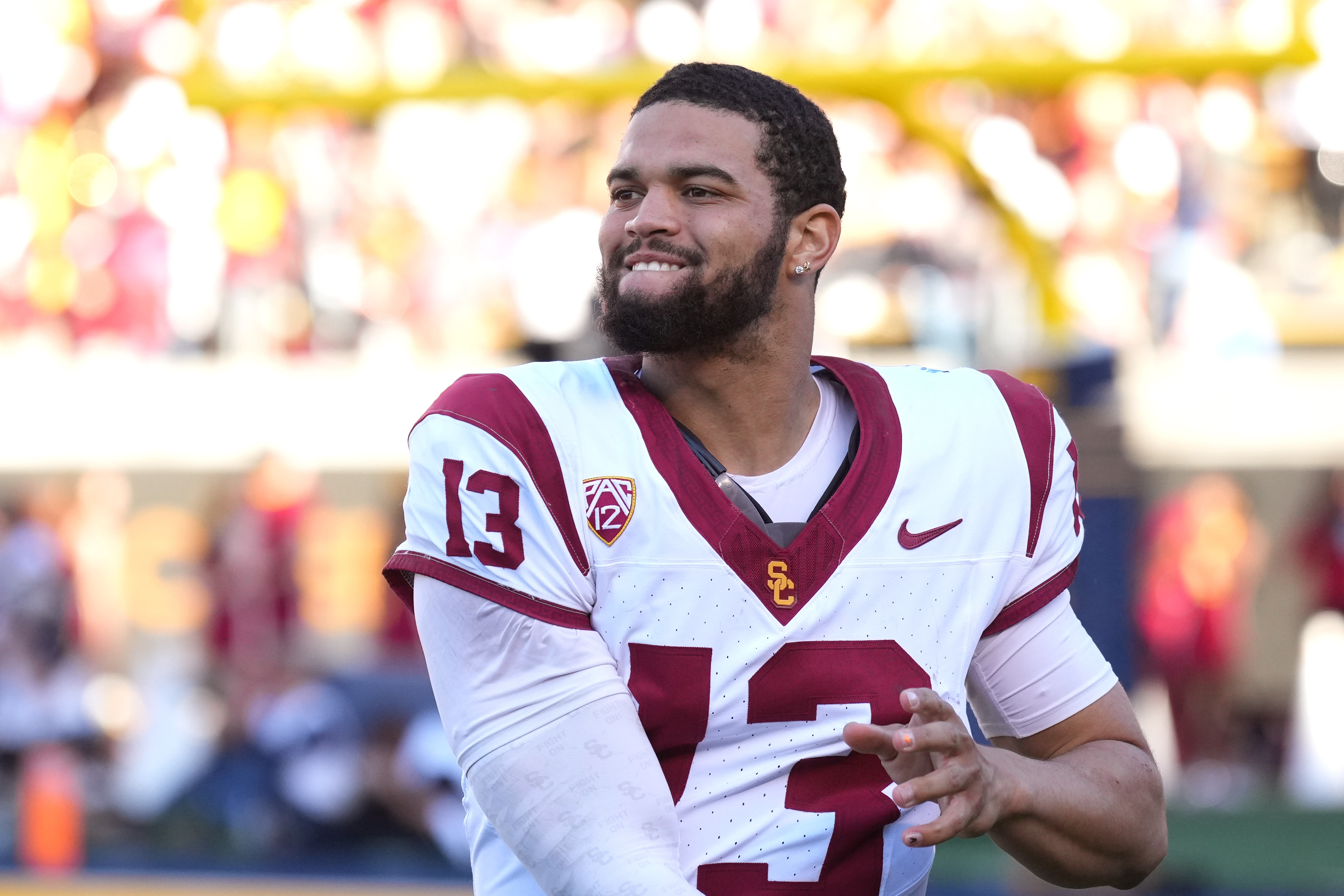 Oct 28, 2023; Berkeley, California, USA; USC Trojans quarterback Caleb Williams (13) warms up during the fourth quarter against the California Golden Bears at California Memorial Stadium. 