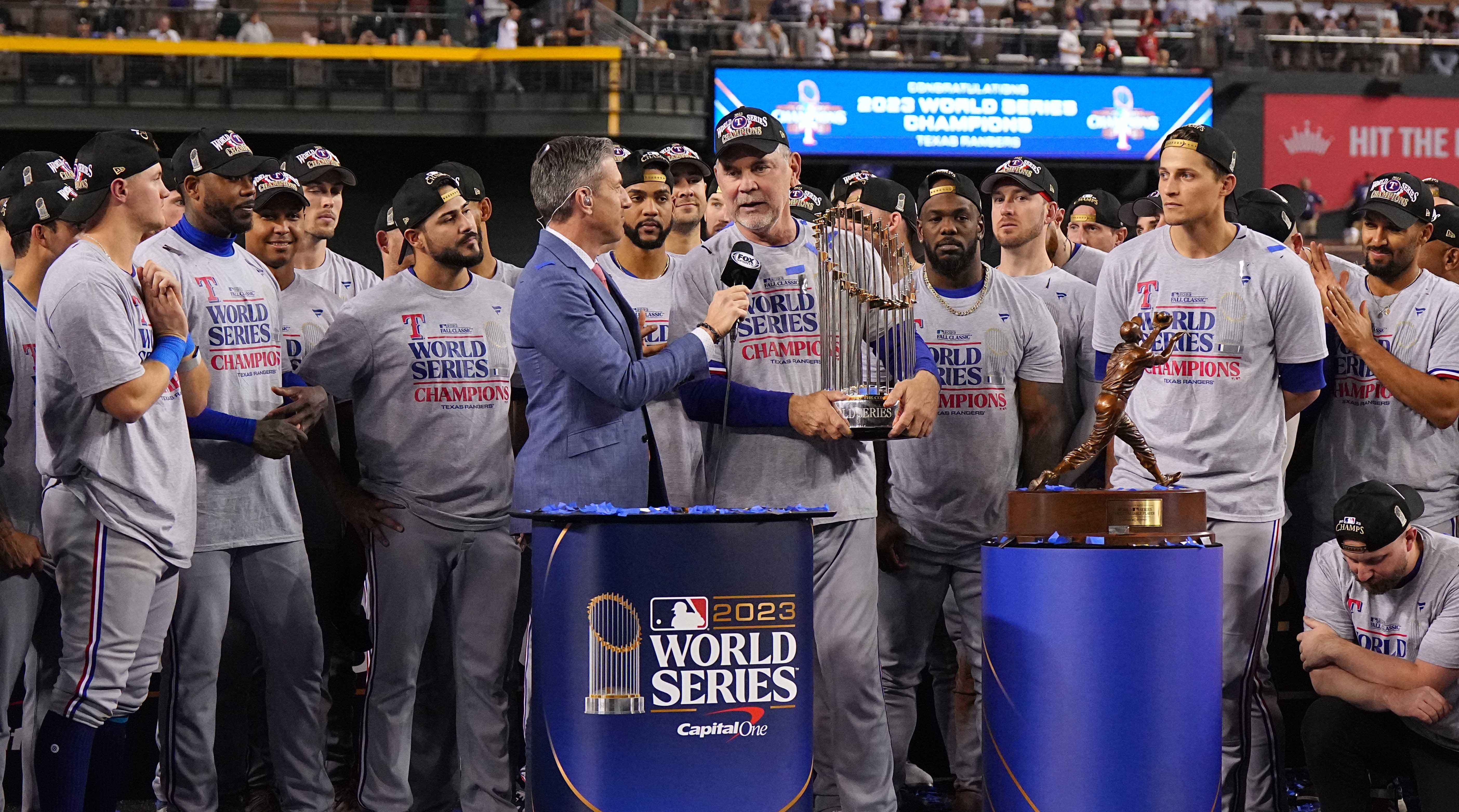 Bruce Bochy with the World Series trophy.