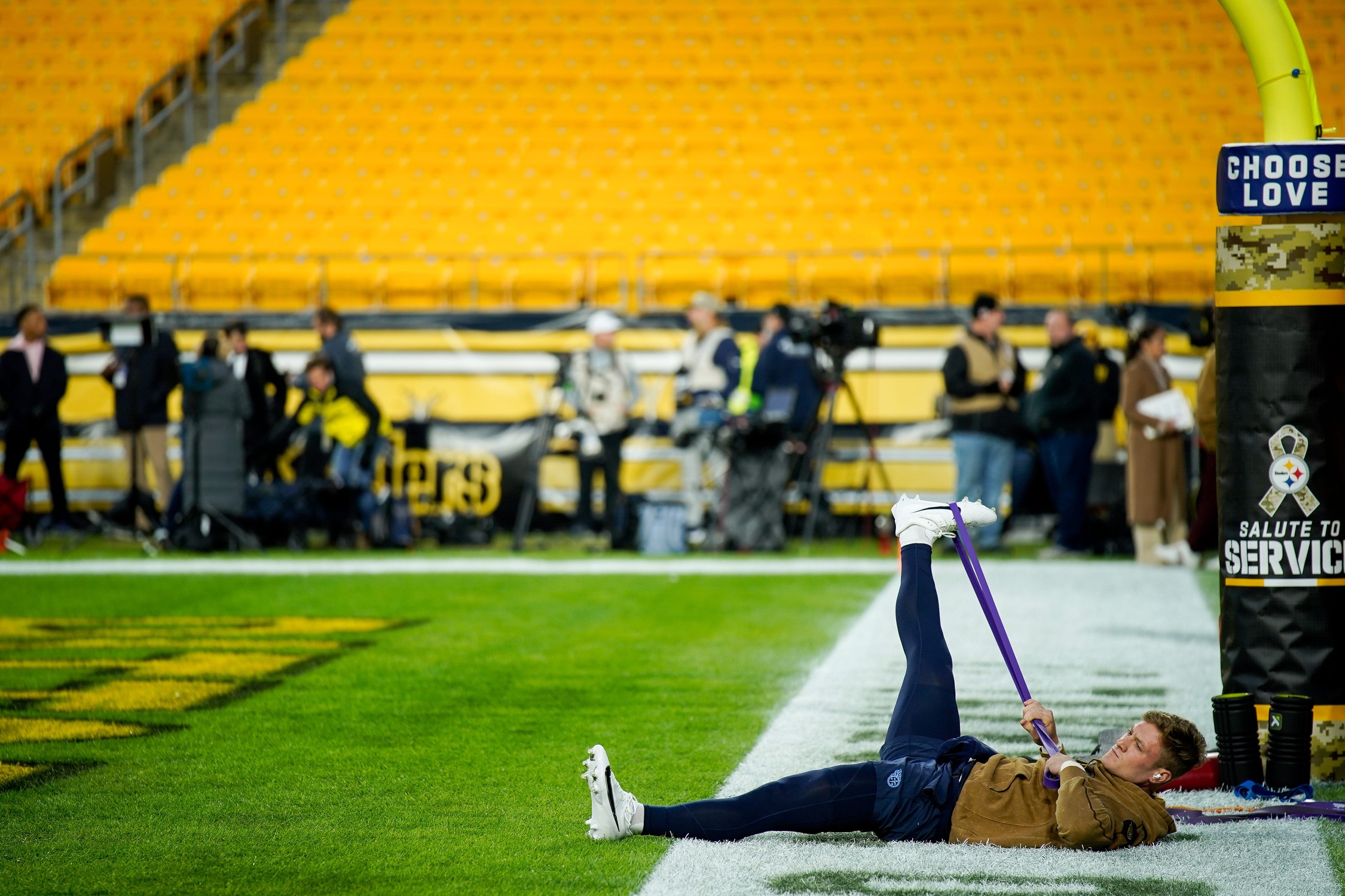 Tennessee Titans quarterback Will Levis (8) stretches before a game against the Pittsburgh Steelers. 