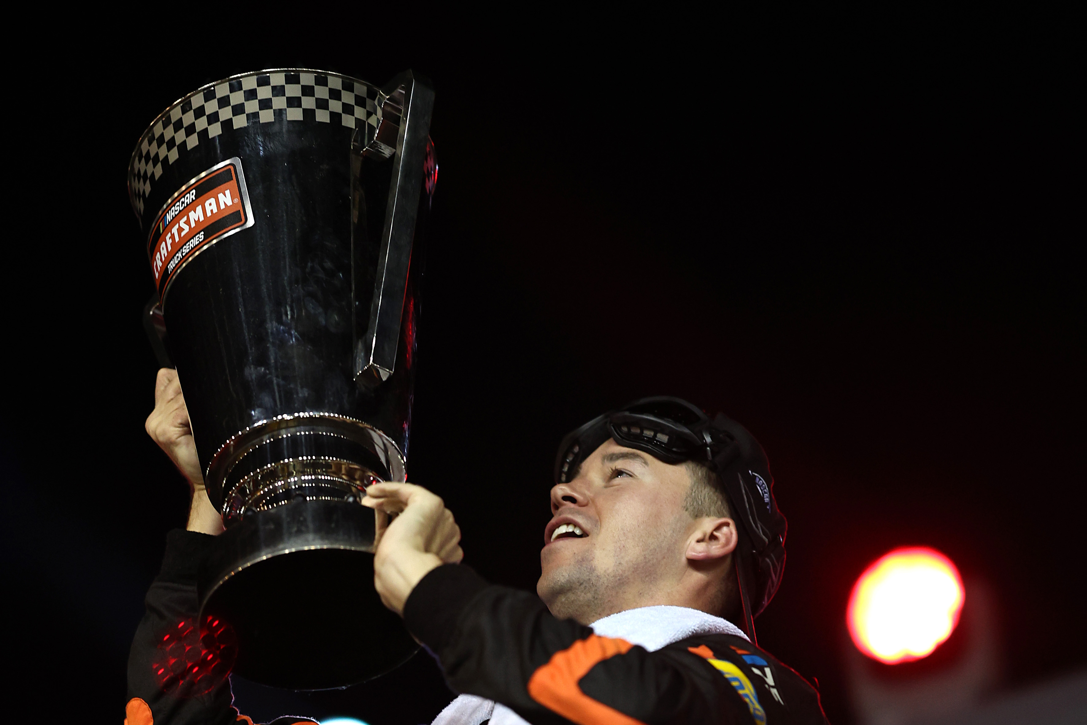 Ben Rhodes celebrates his second NASCAR Trucks championship in three years in Friday's season finale at Phoenix Raceway.(Photo by Jared C. Tilton/Getty Images)