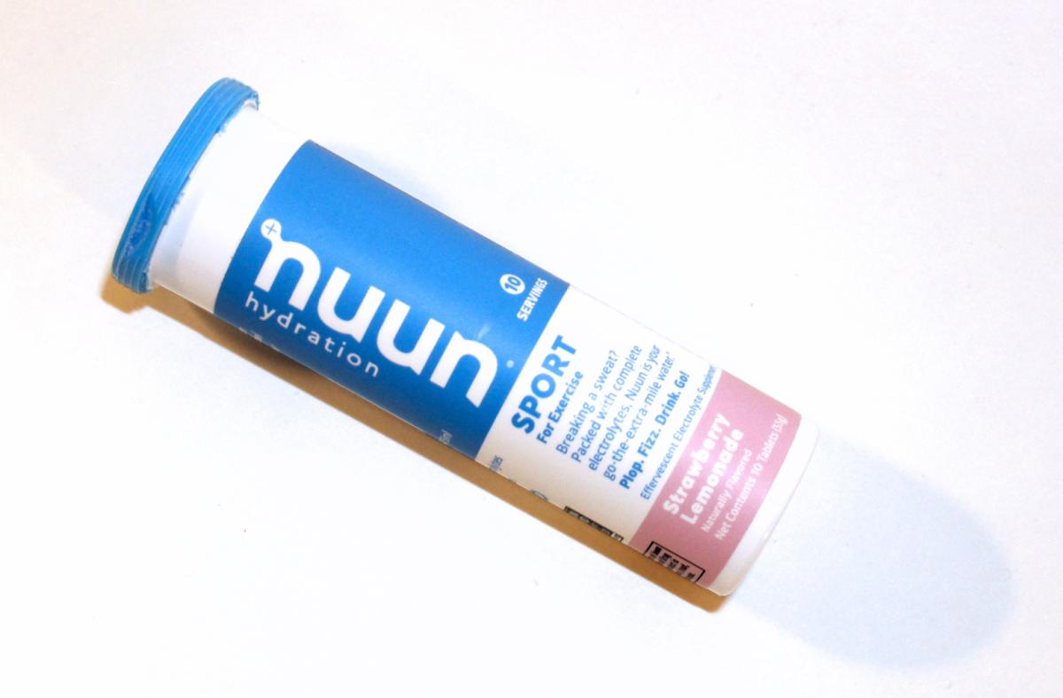 nuun hydration Sport tablets in Strawberry Lemonade flavor against a white background
