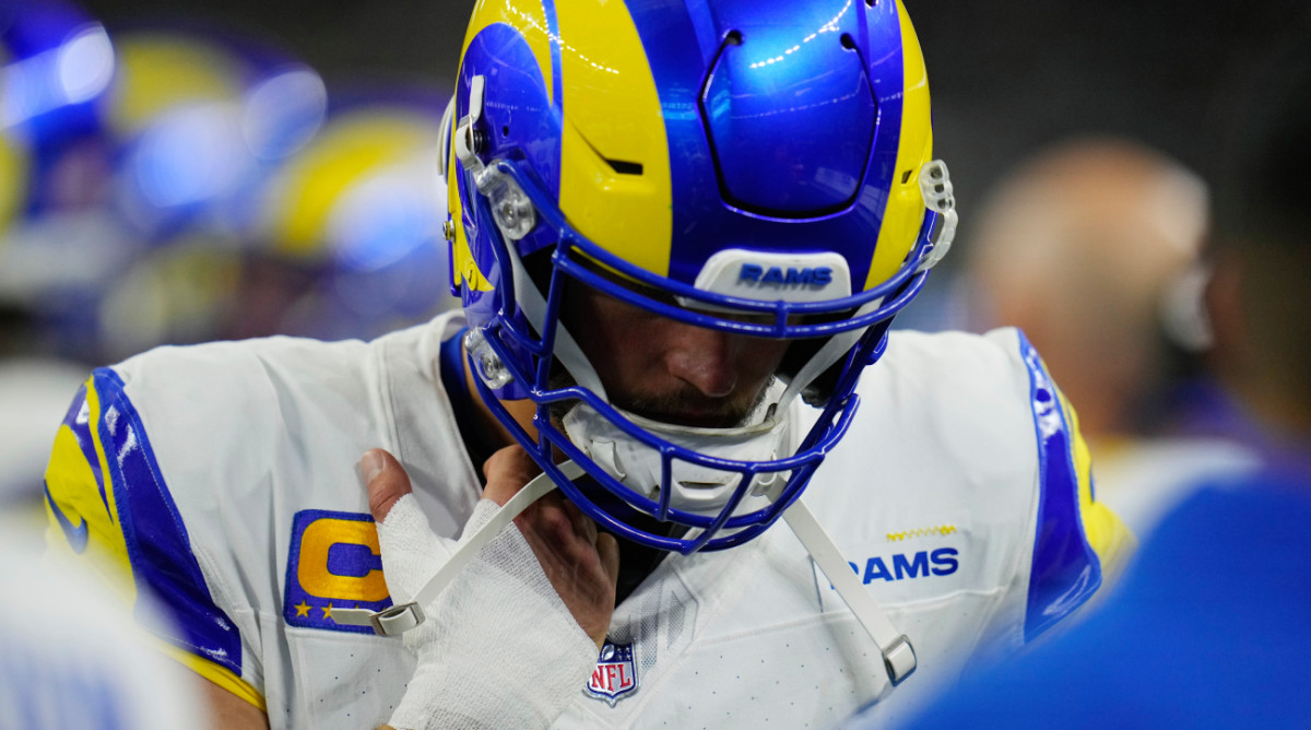 Los Angeles Rams quarterback Matthew Stafford wears a bandage on his throwing hand during the second half of an NFL football game against the Dallas Cowboys Sunday, Oct. 29, 2023, in Arlington, Texas. (AP Photo/Julio Cortez)   