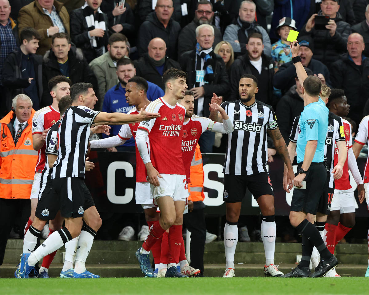 Kai Havertz (center) pictured receiving a yellow card during Arsenal's EPL game away at Newcastle in November 2023