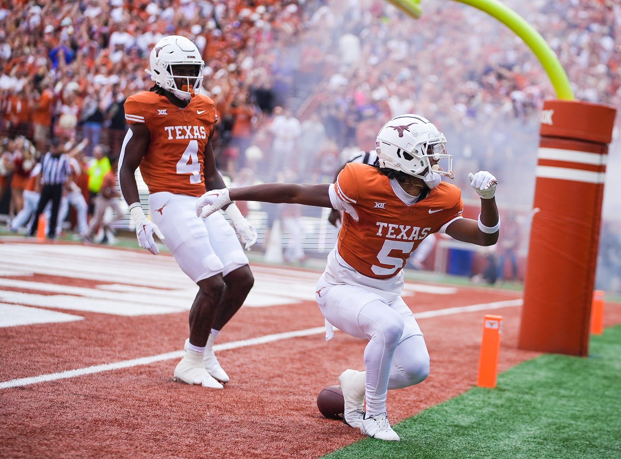 Texas Longhorns wide receiver Adonai Mitchell (5) celebrates a touchdown in the first quarter of an NCAA college football game, Saturday, November. 4, 2023, in Austin, Texas