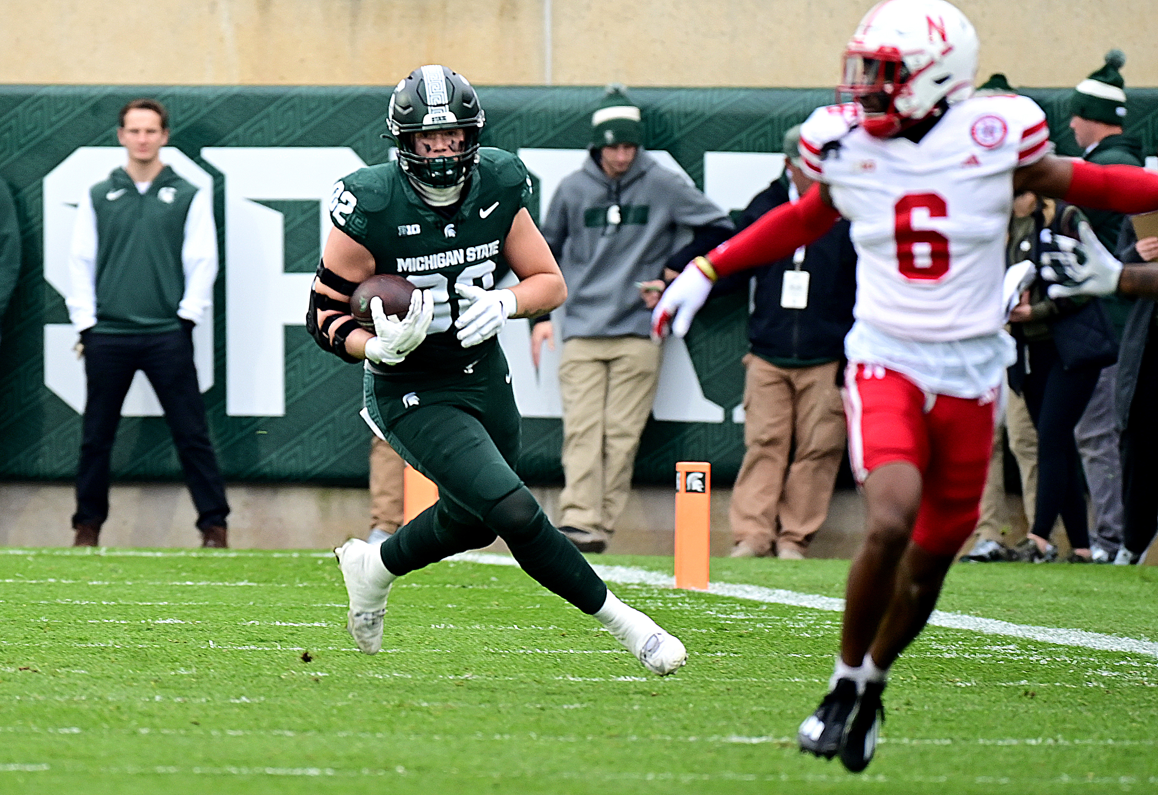 NU vs. MSU 2023 - Brennan Parachek runs behind Quinton Newsome