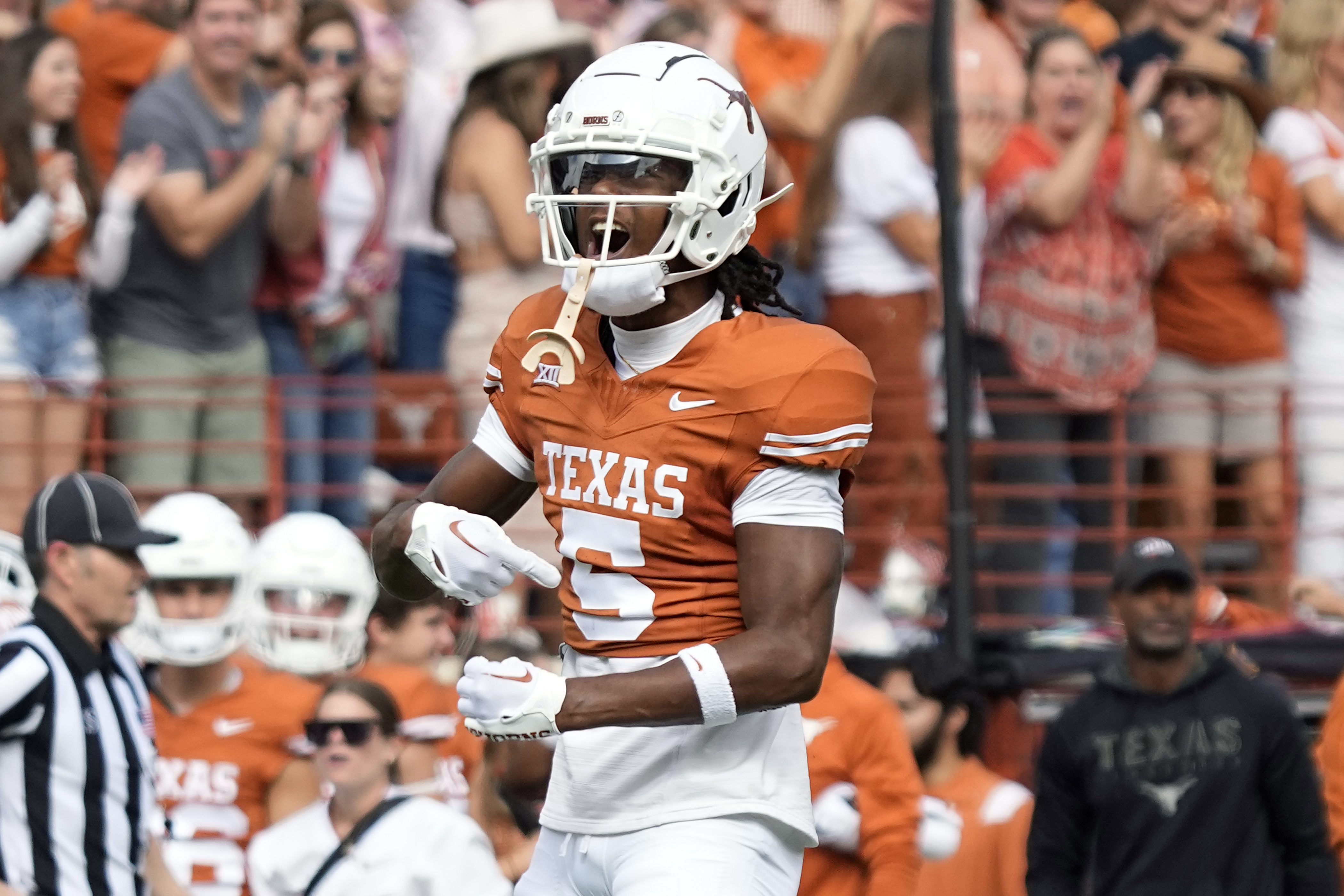 Nov 4, 2023; Austin, Texas, USA; Texas Longhorns wide receiver Adonai Mitchell (5) reacts after making a catch during the second half against the Kansas State Wildcats at Darrell K Royal-Texas Memorial Stadium.