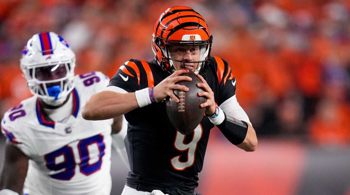 Bengals quarterback Joe Burrow evades pressure in the pocket