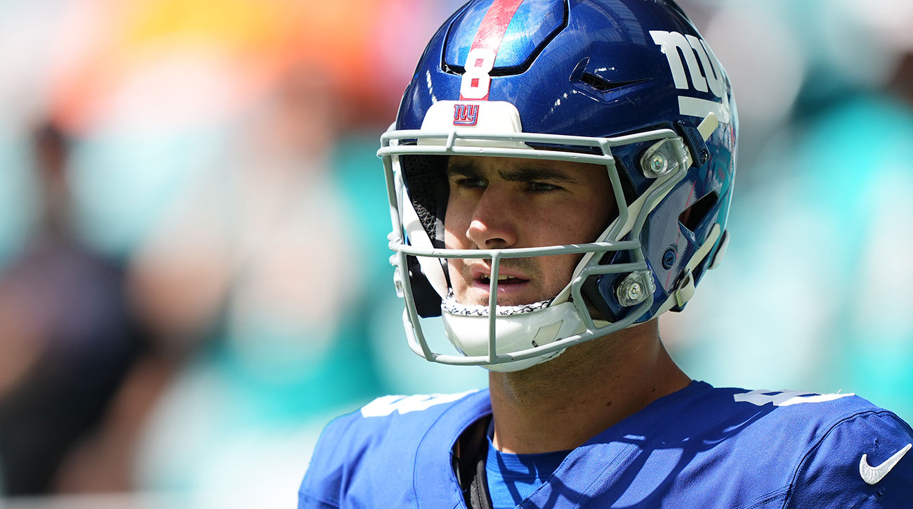 Daniel Jones walks onto the field before a game