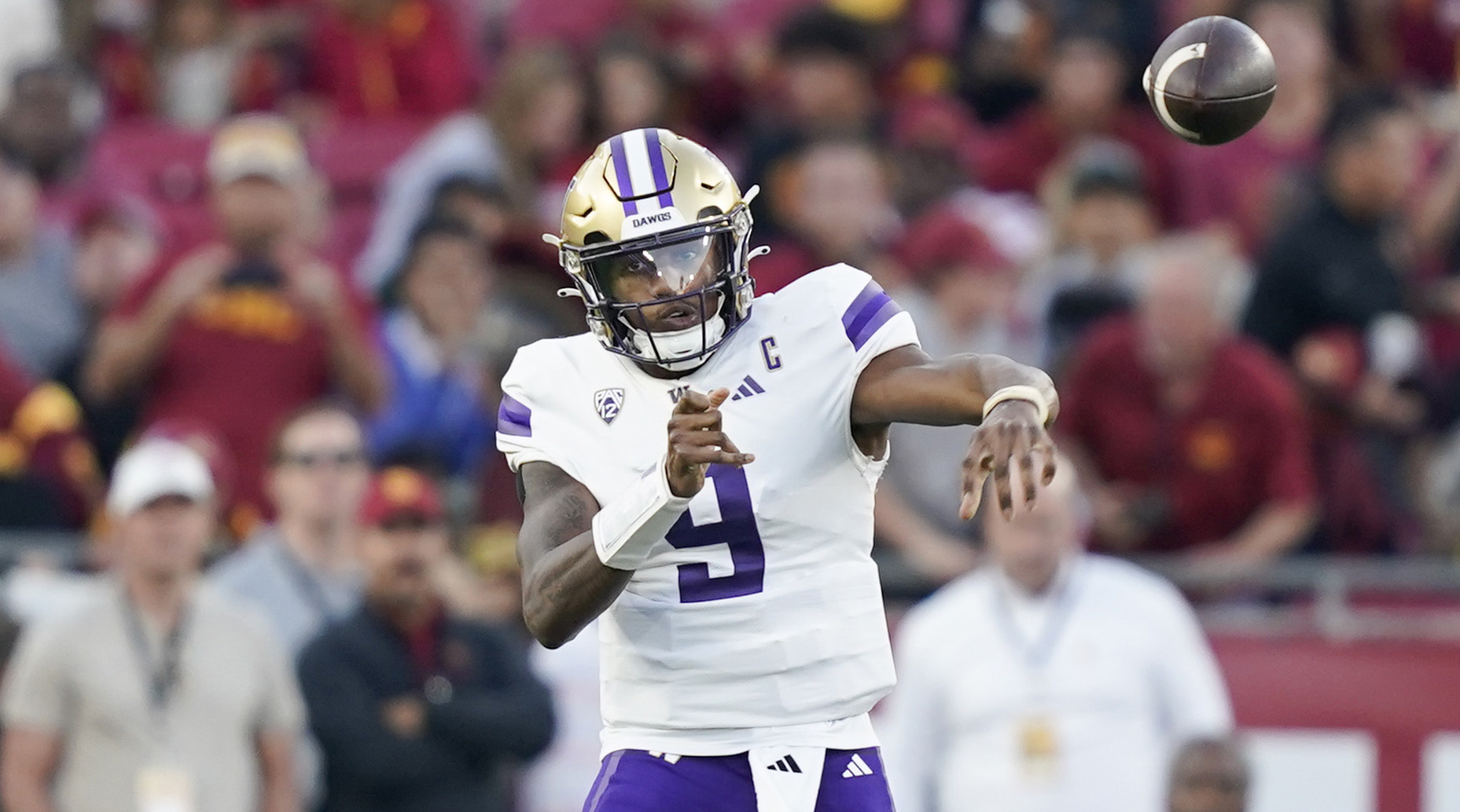 Washington quarterback Michael Penix Jr. throws a pass while playing against USC.