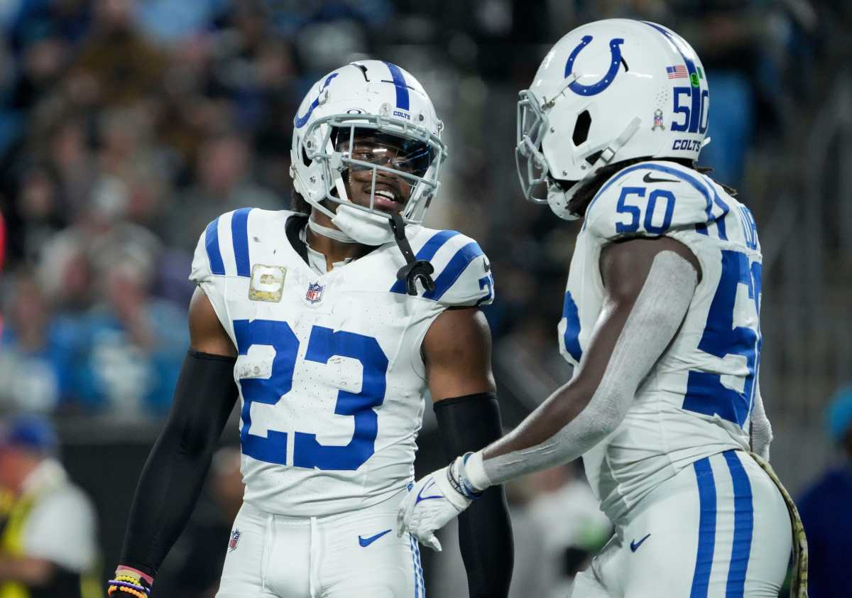 Indianapolis Colts cornerback Kenny Moore II (23) talks with Indianapolis Colts linebacker Segun Olubi (50) between plays Sunday, Nov. 5, 2023, during a game against the Carolina Panthers at Bank of America Stadium in Charlotte.