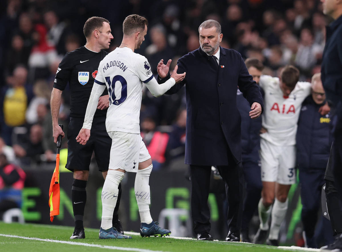 James Maddison pictured shaking hands with Tottenham manager Ange Postecoglou after being substituted off during a 4-1 loss to Chelsea in November 2023