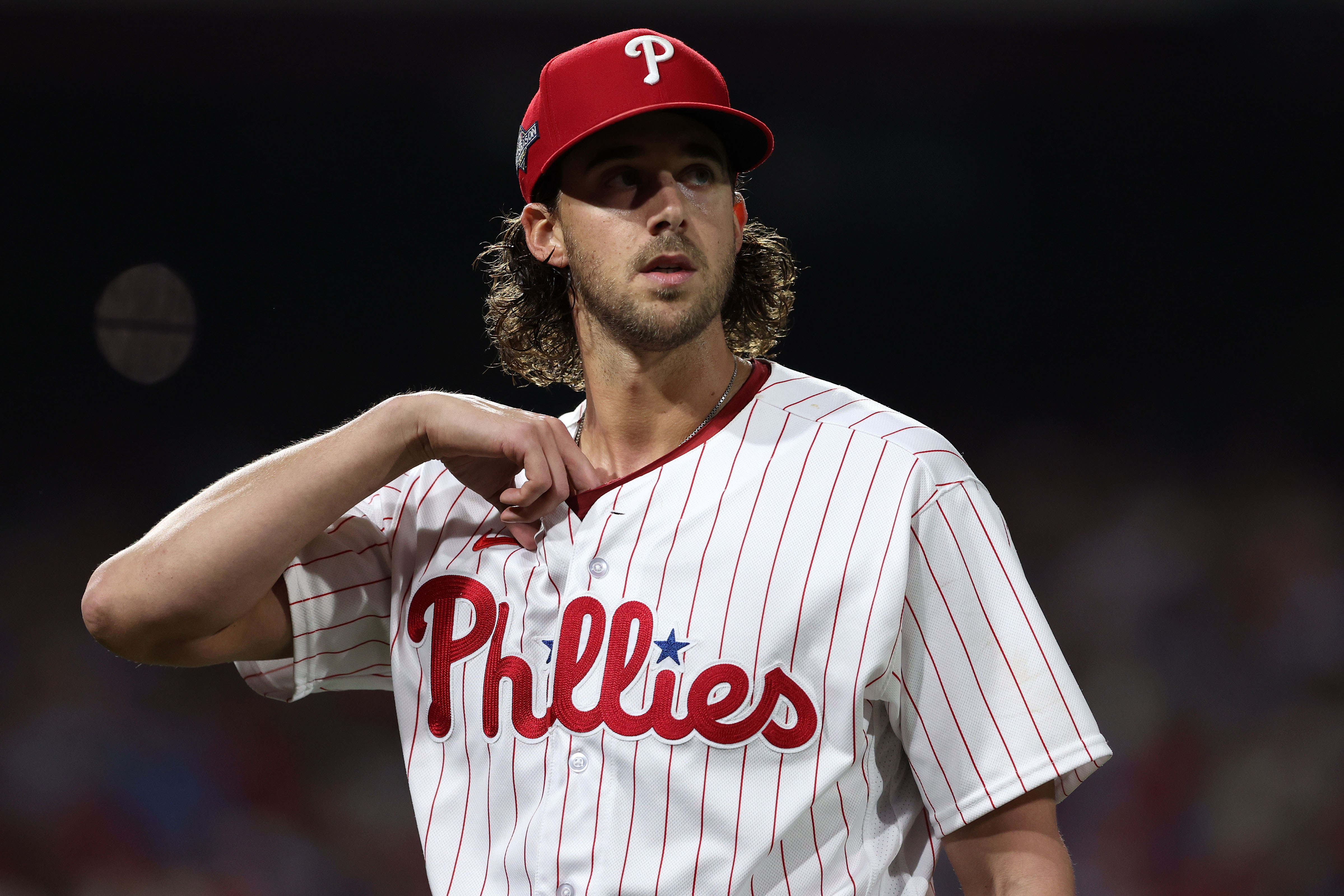 Oct 17, 2023; Philadelphia, Pennsylvania, USA; Philadelphia Phillies starting pitcher Aaron Nola (27) walks to the dug out after the inning against the Arizona Diamondbacks in the fourth inning for game two of the NLCS for the 2023 MLB playoffs at Citizens Bank Park. Mandatory Credit: Bill Streicher-USA TODAY Sports