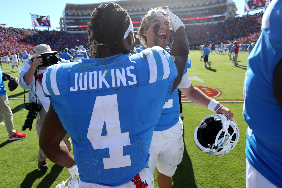 Nov 4, 2023; Oxford, Mississippi, USA; Mississippi Rebels running back Quinshon Judkins (4) and quarterback Jaxson Dart (2) react after defeating the Texas A&M Aggies at Vaught-Hemingway Stadium. (Petre Thomas / USA TODAY Sports).