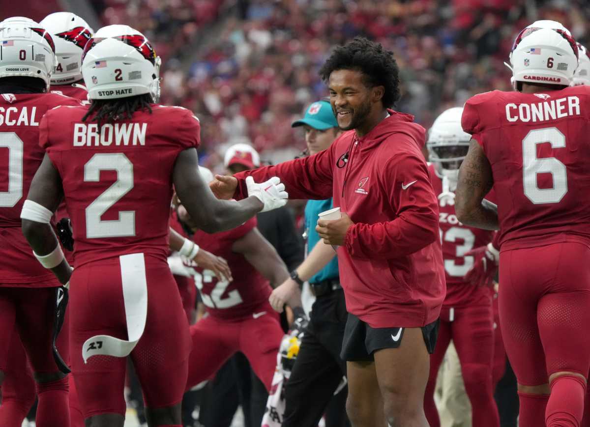 Arizona Cardinals quarterback Kyler Murray congratulates his teammates after a touchdown against the New York Giants at State Farm Stadium in Glendale on Sept. 17, 2023.