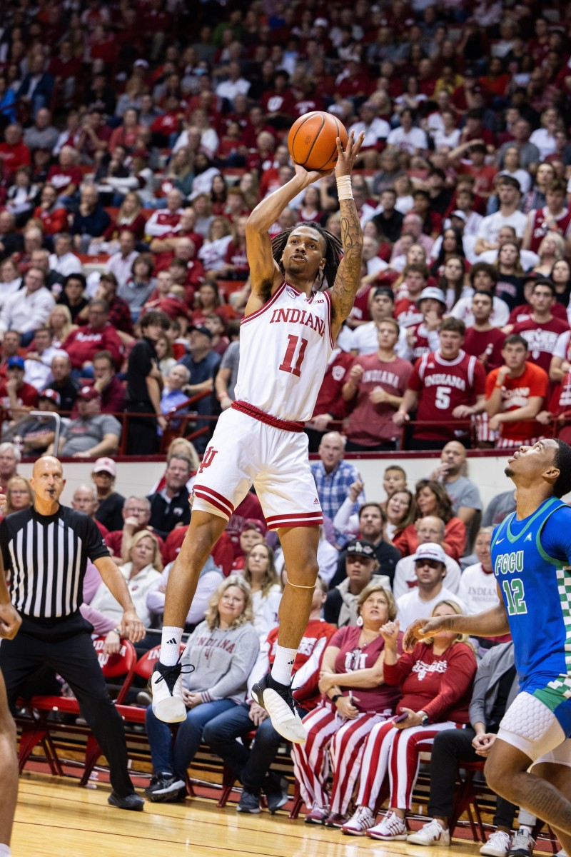 Indiana Hoosiers guard CJ Gunn (11) shoots in the first half against the Florida Gulf Coast Eagles at Simon Skjodt Assembly Hall. 