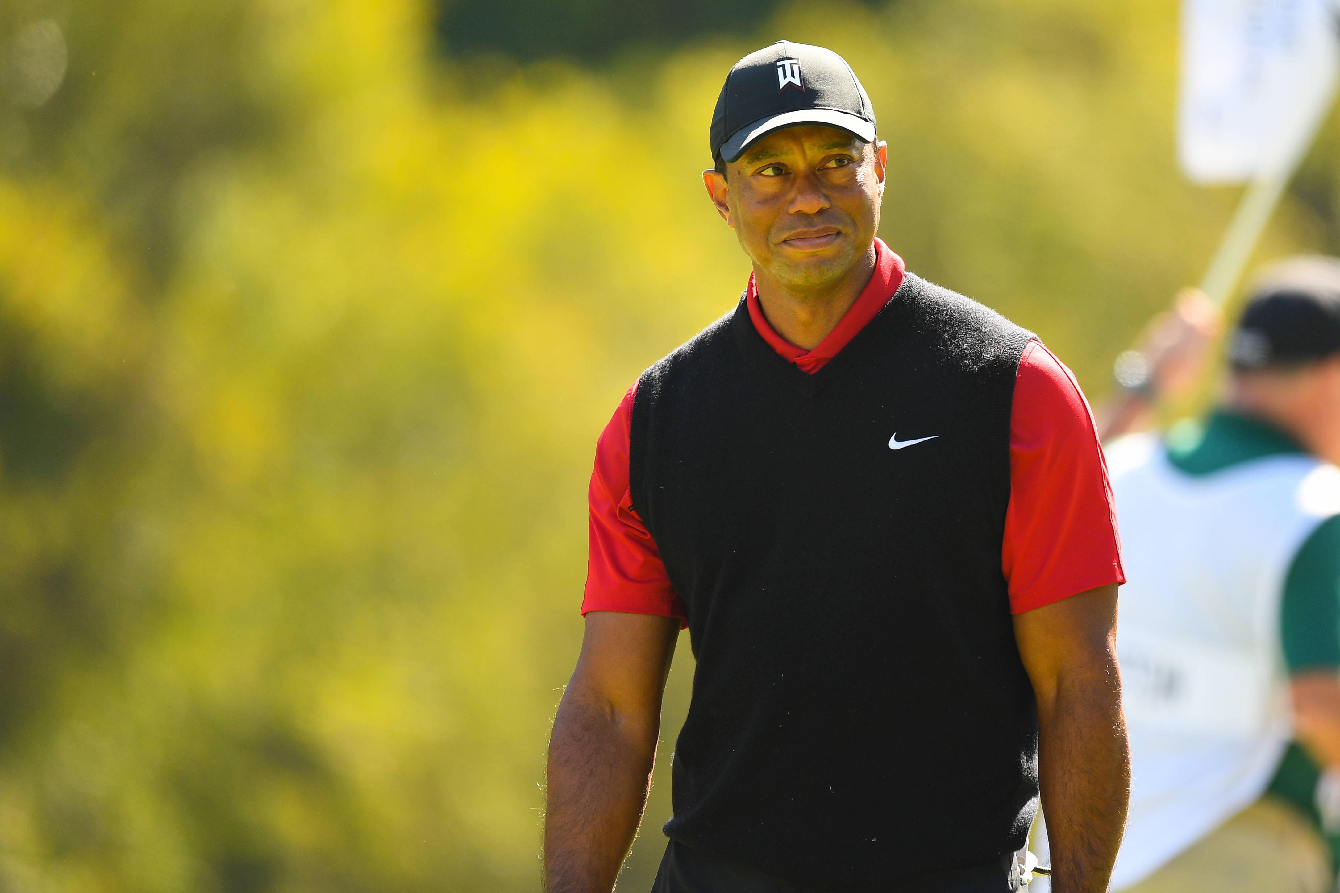 Tiger Woods looks on after a birdie on the 13th hole during the final round of the Genesis Invitational on February 19, 2023, at Riviera Country Club in Pacific Palisades, CA.
