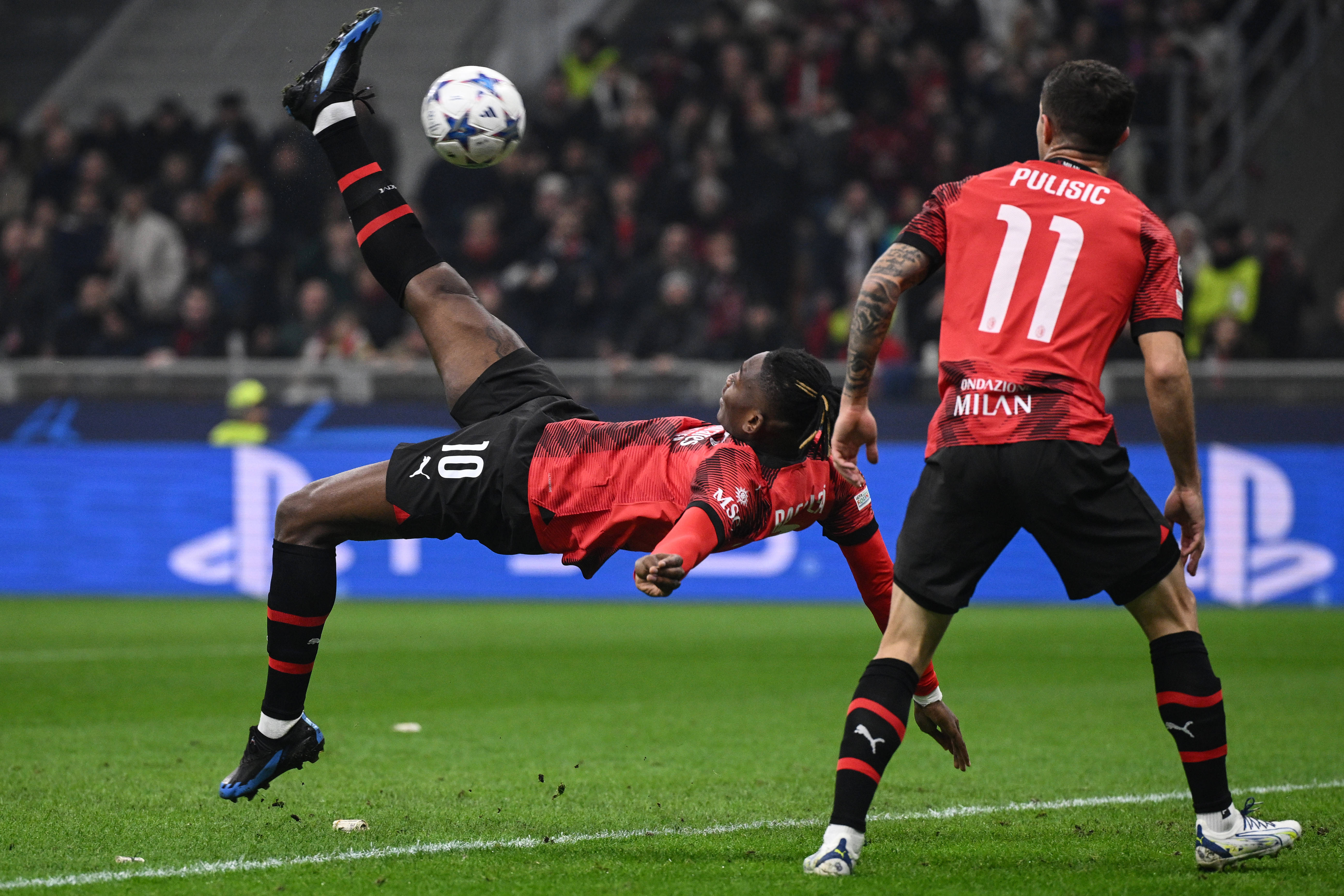 Rafael Leao pictured (left) scoring for AC Milan against PSG with an overhead kick in November 2023