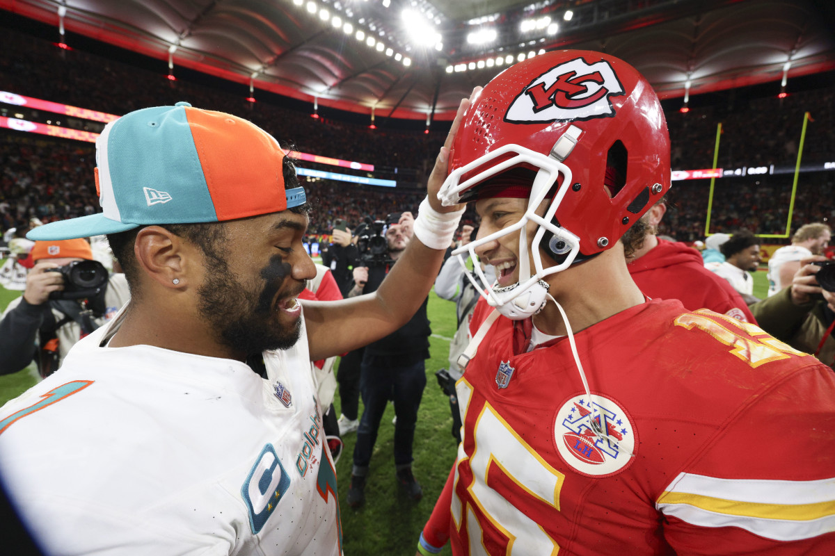 Kansas City Chiefs quarterback Patrick Mahomes greets Miami Dolphins quarterback Tua Tagovailoa after an NFL International Series game at Deutsche Bank Park.