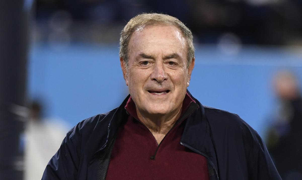 Al Michaels walks on the field before the game between the Tennessee Titans and the Dallas Cowboys at Nissan Stadium.
